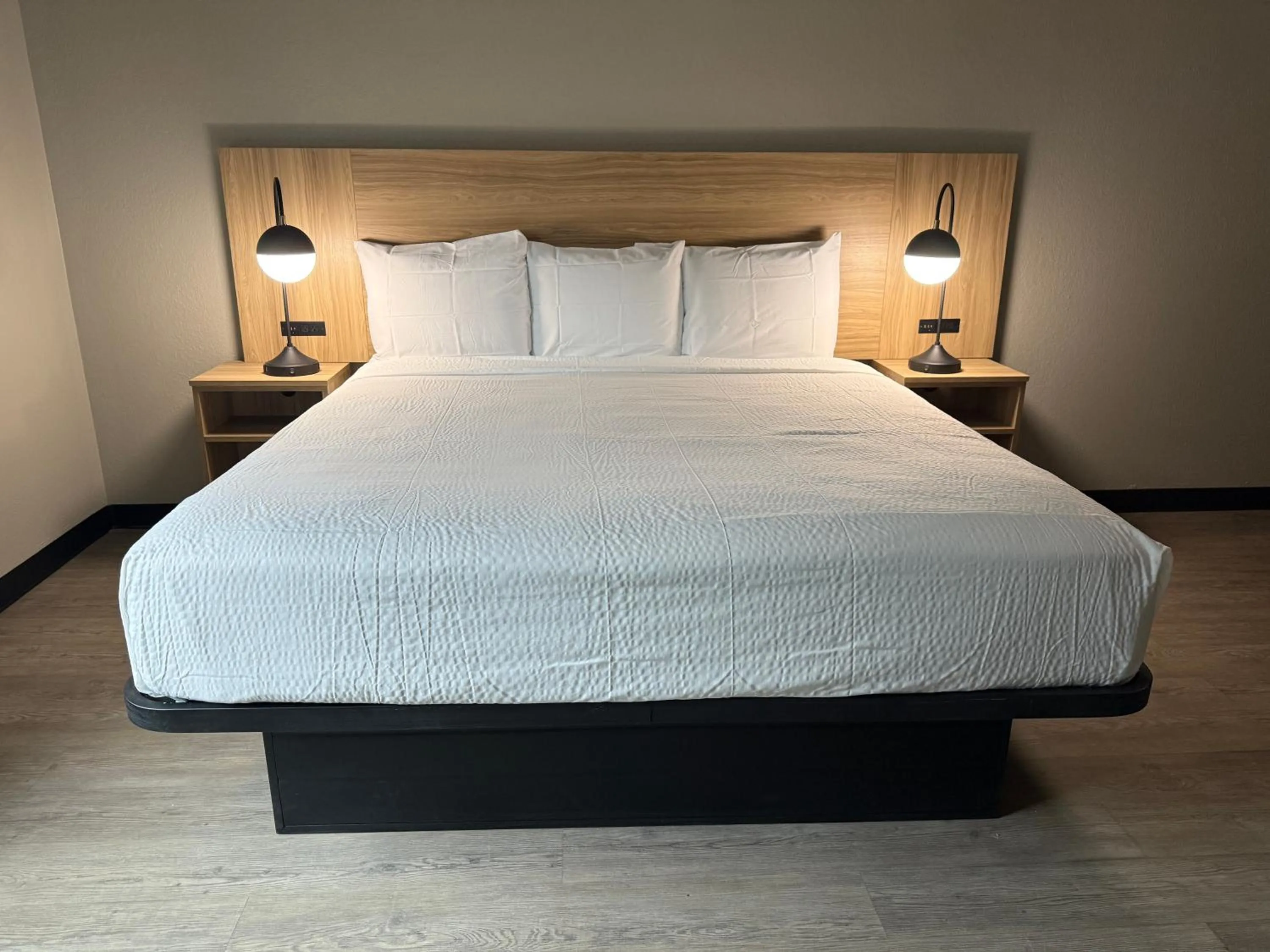 Bed in Super 8 by Wyndham Richfield Cleveland