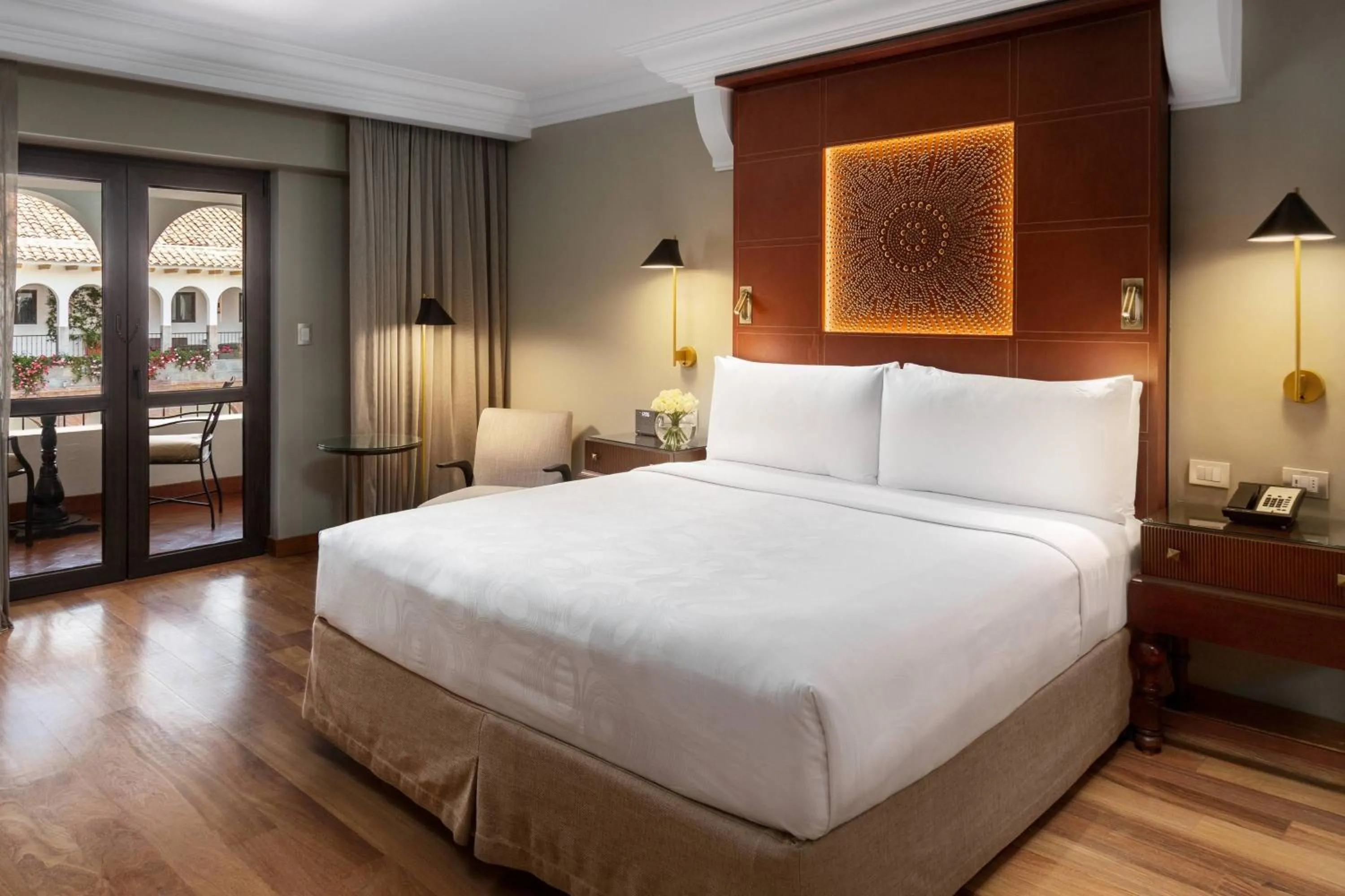 Photo of the whole room, Bed in JW Marriott El Convento Cusco