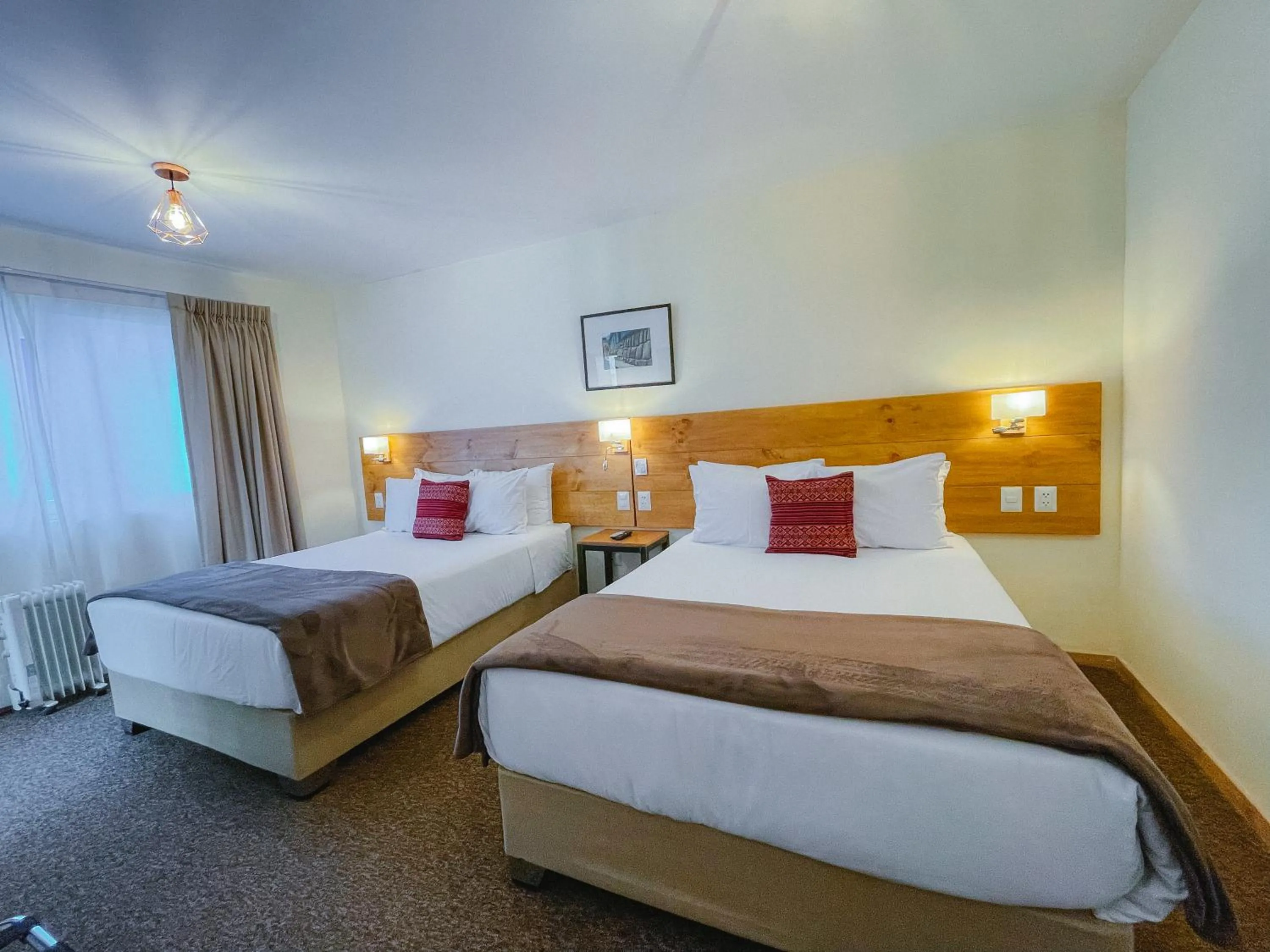 Bed in Cooper Hotel Boutique