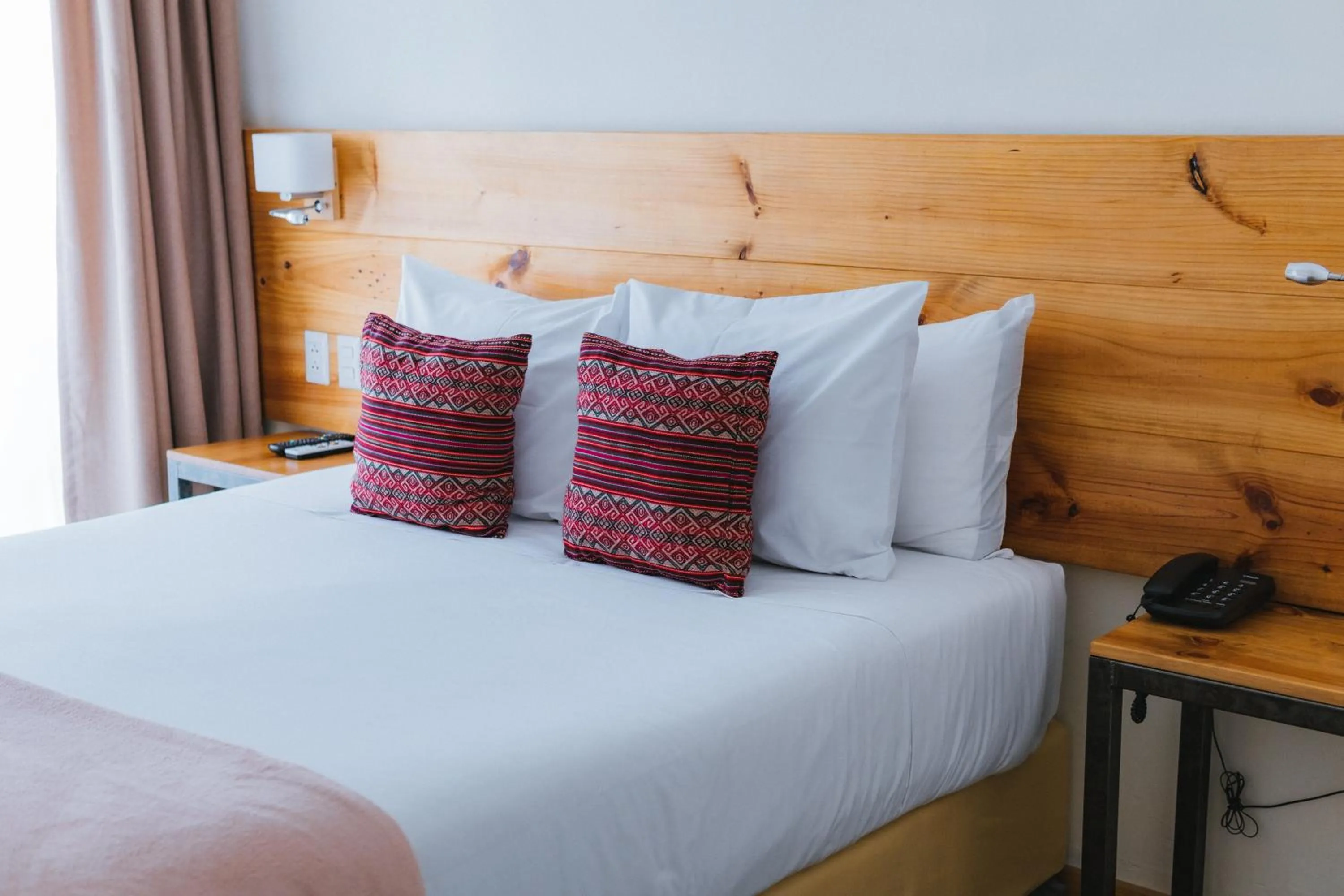 Bed in Cooper Hotel Boutique