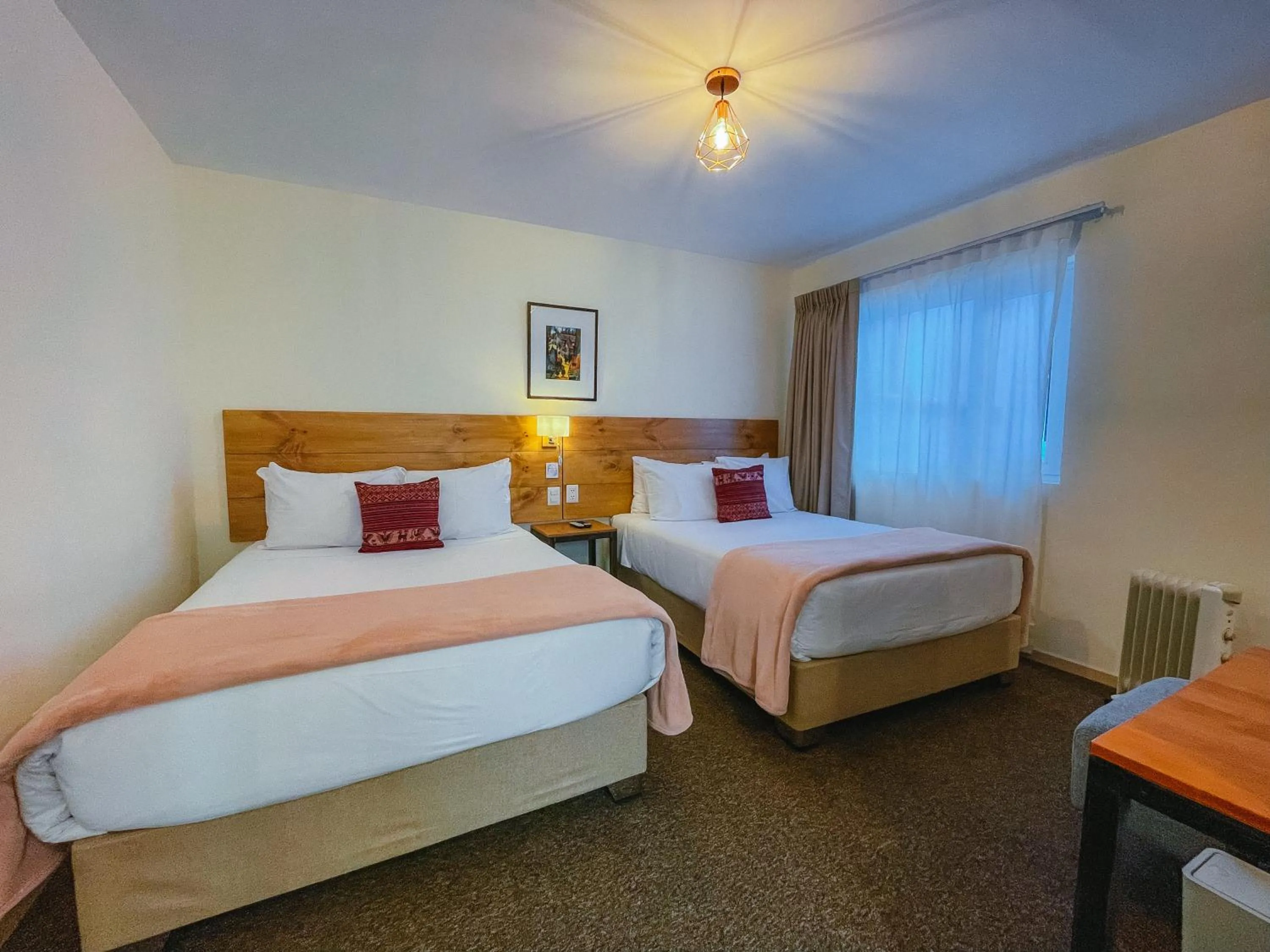 Bed in Cooper Hotel Boutique