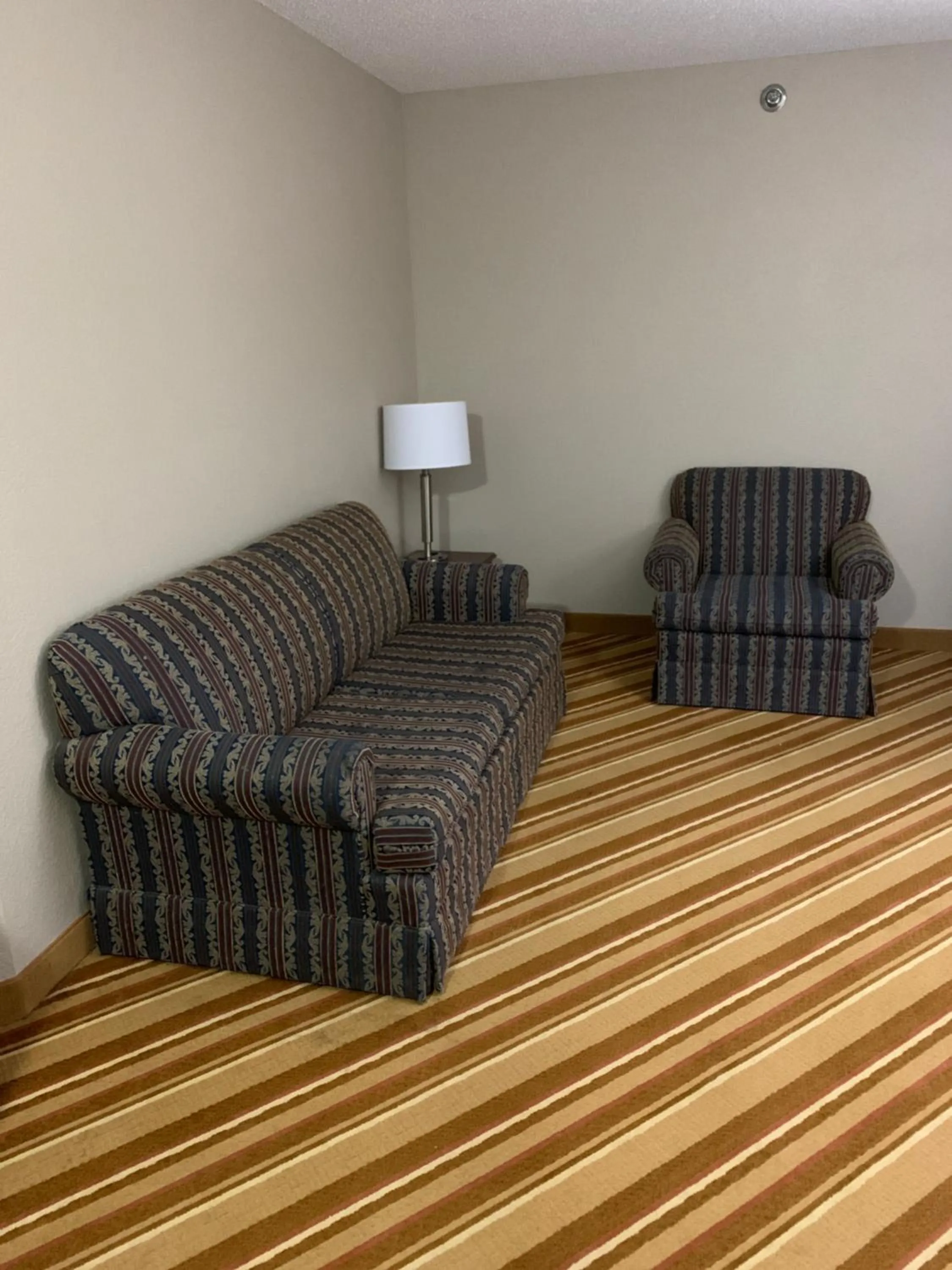 Seating area in Super 8 by Wyndham O Neill NE