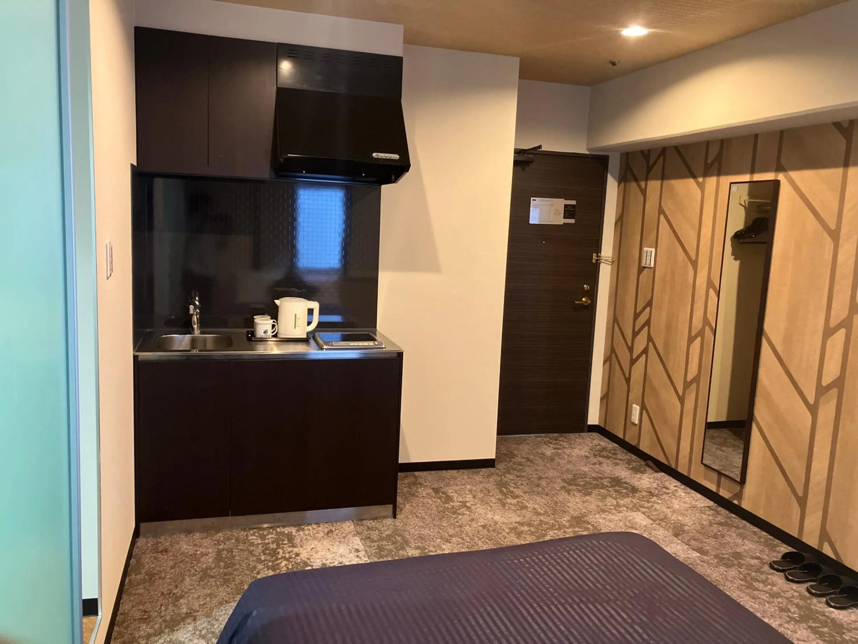 Bed in HOTEL LiVEMAX BUDGET Naha