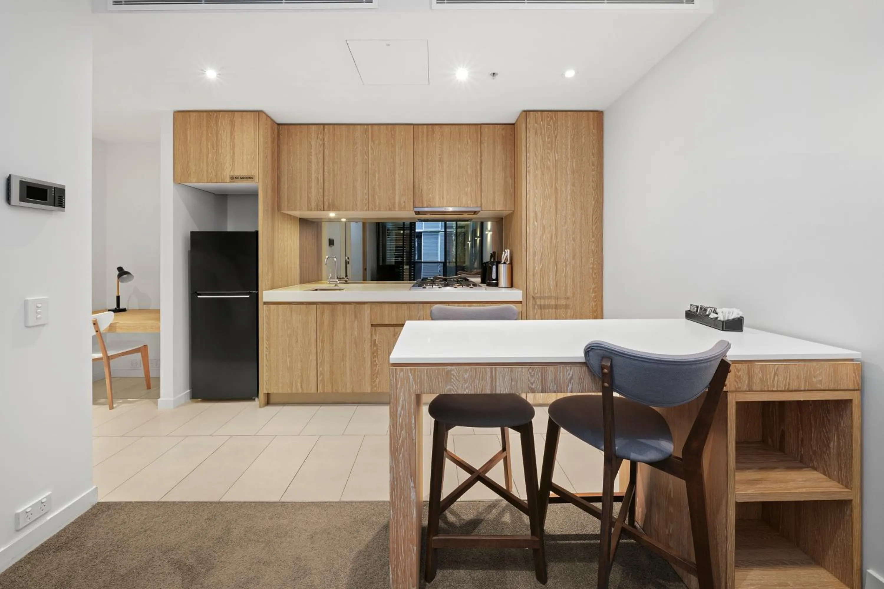 Kitchen or kitchenette in Flinders Street Apartments