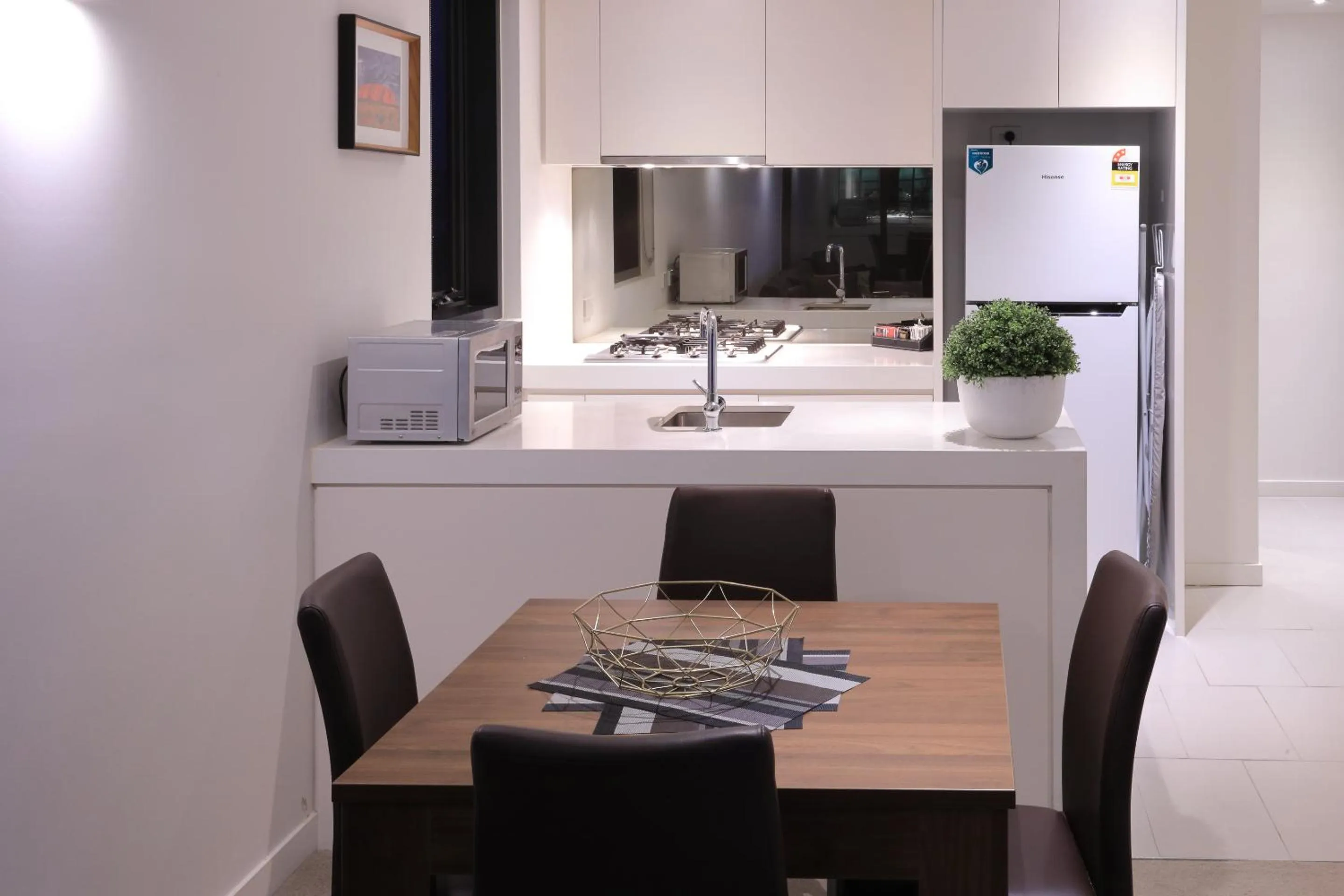 Kitchen or kitchenette in Flinders Street Apartments