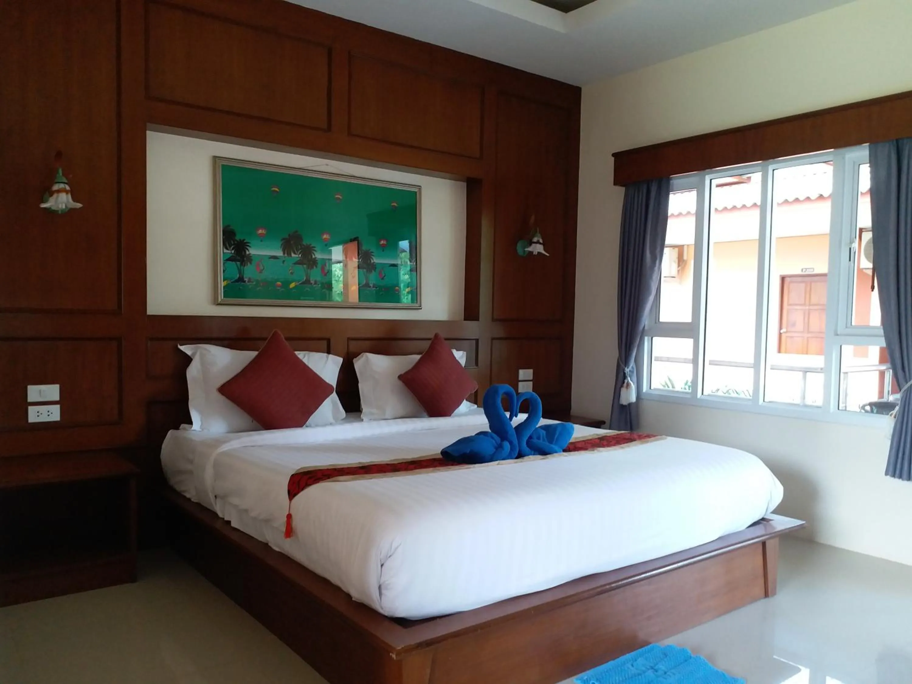 Bed in Tamarind Lanta Resort