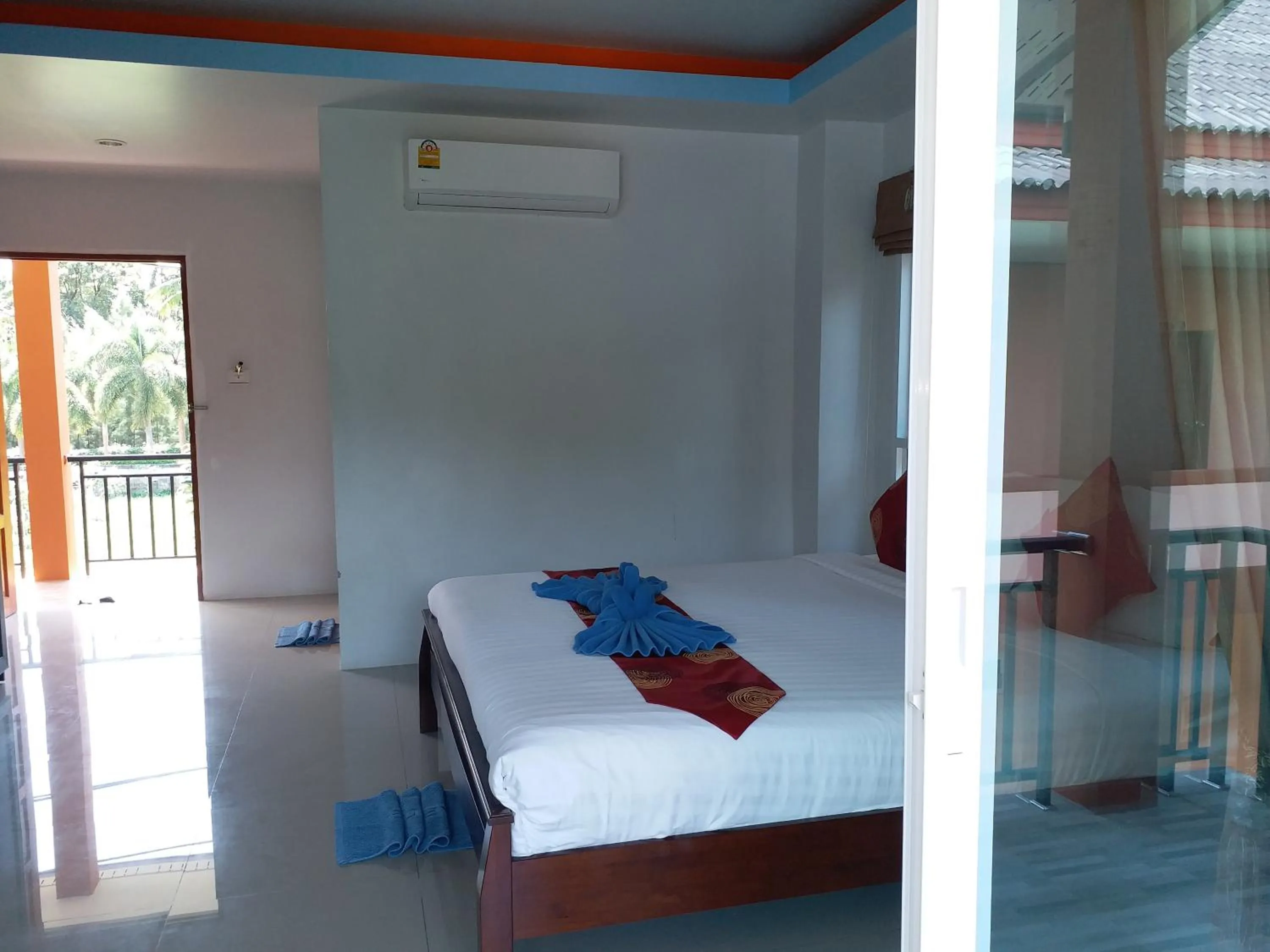 Bed in Tamarind Lanta Resort