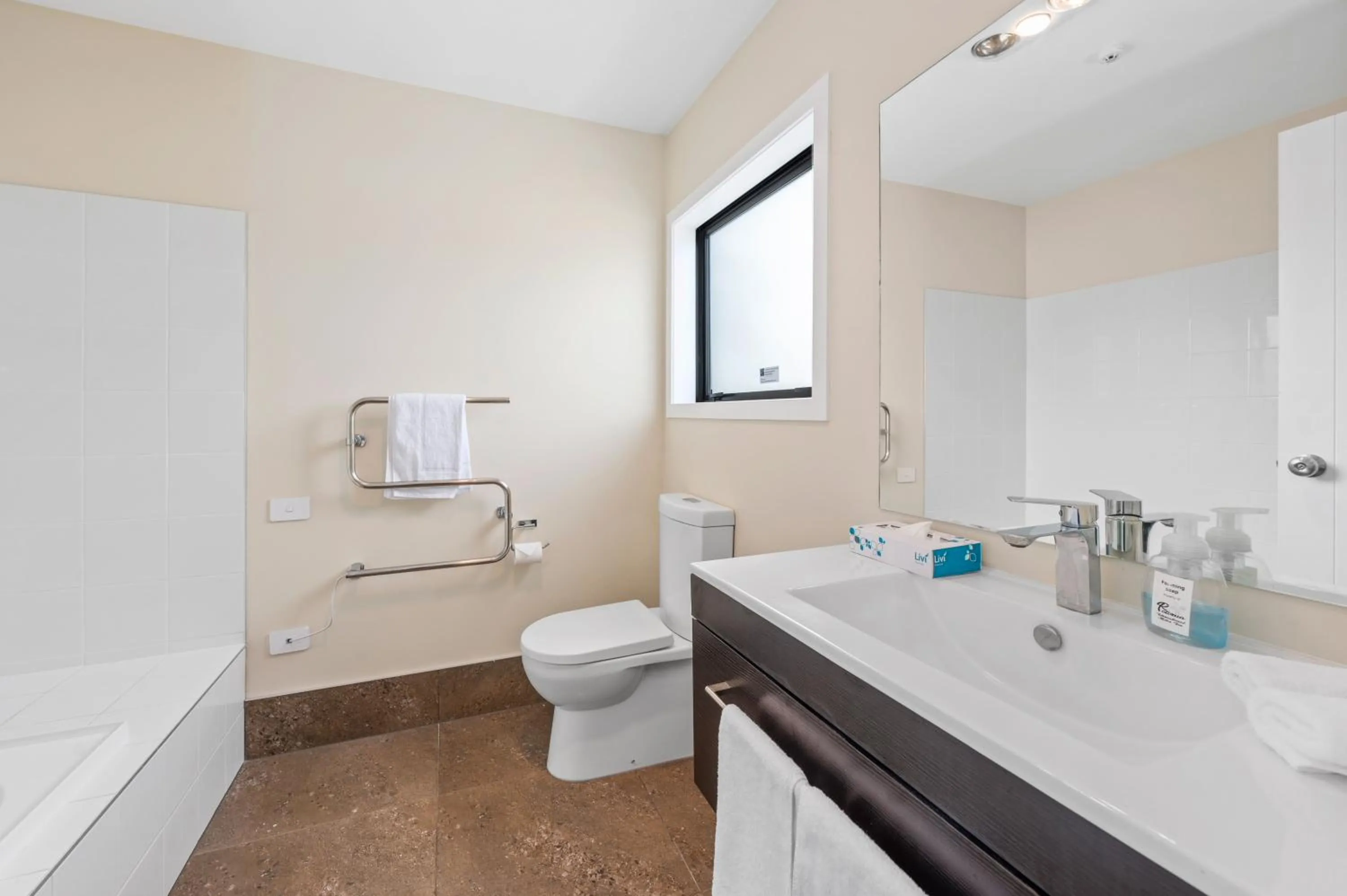 Toilet in ASURE Rotorua International Motor Inn