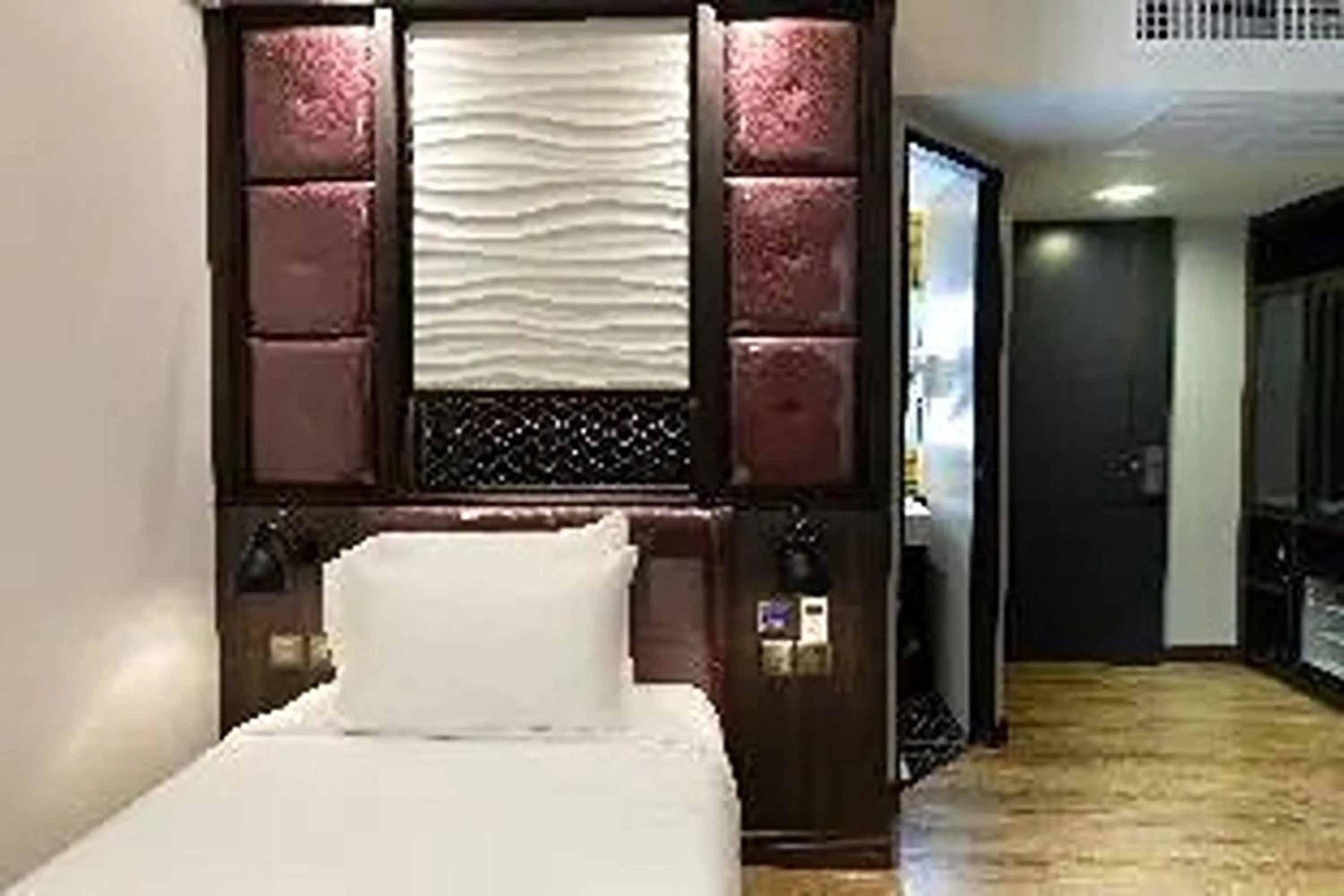 Bed in Holatel Hotel Phitsanulok