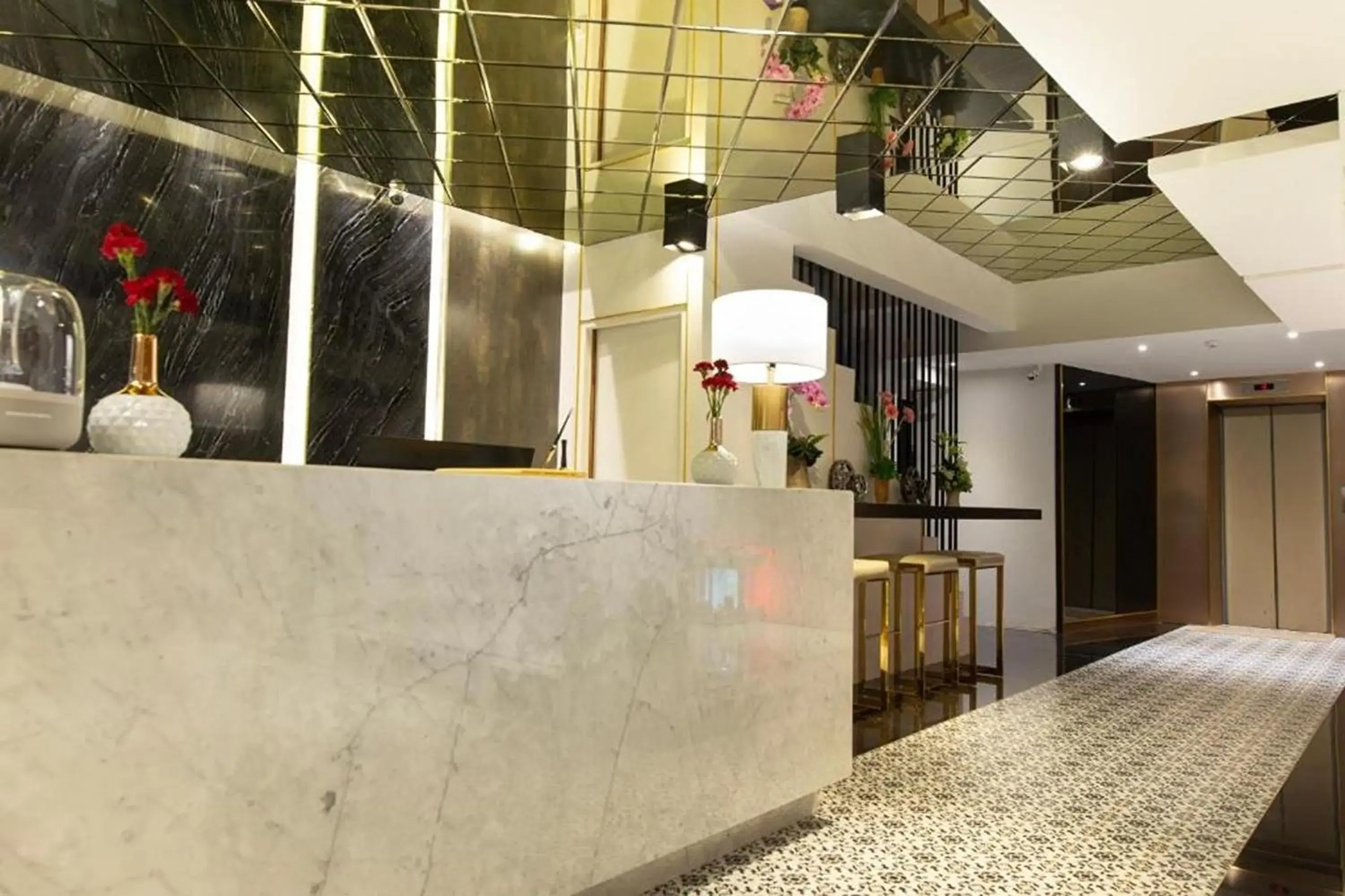 Lobby or reception in Holatel Hotel Phitsanulok Lobby or reception in Holatel Hotel Phitsanulok
