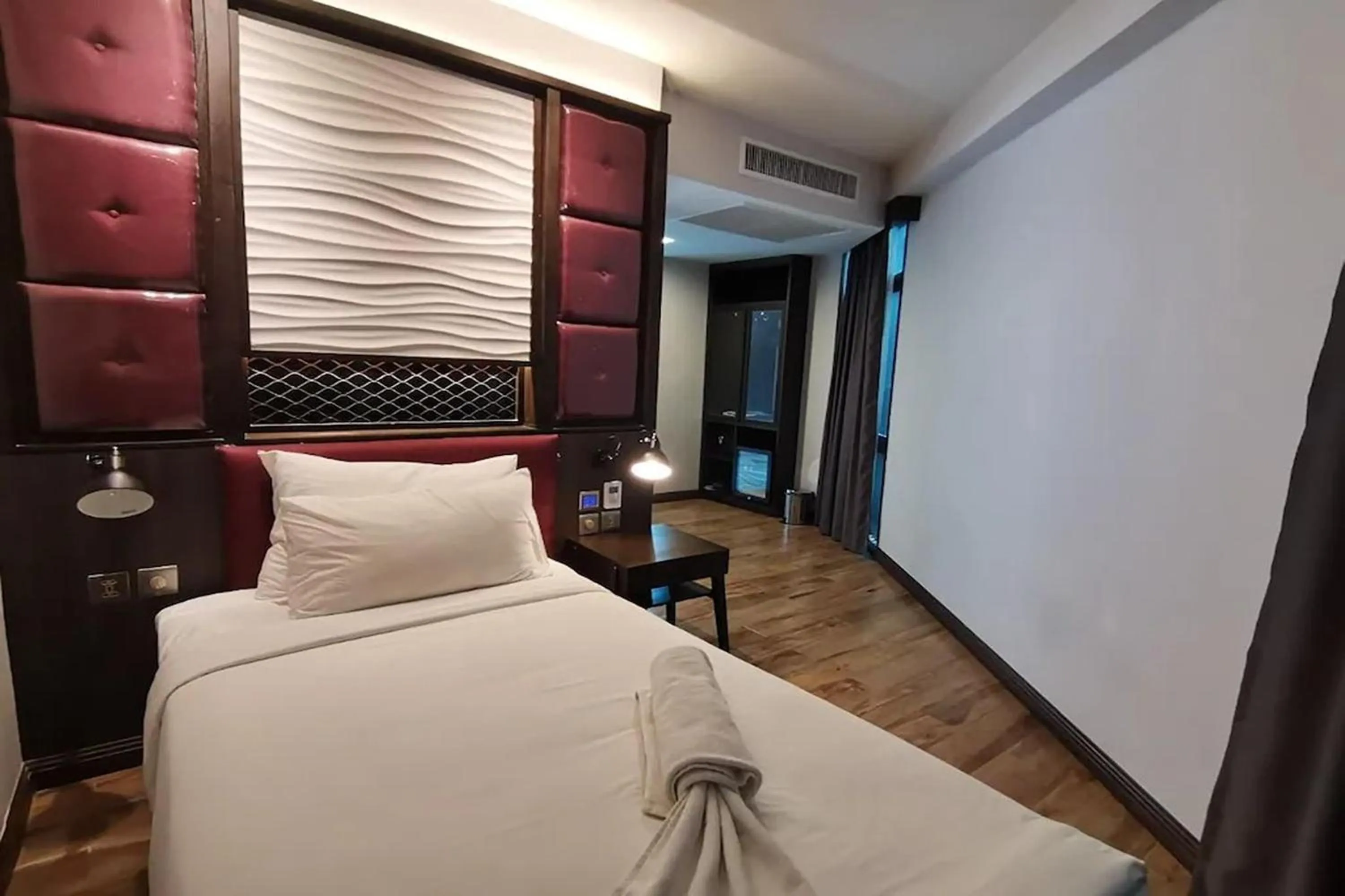 Bed in Holatel Hotel Phitsanulok