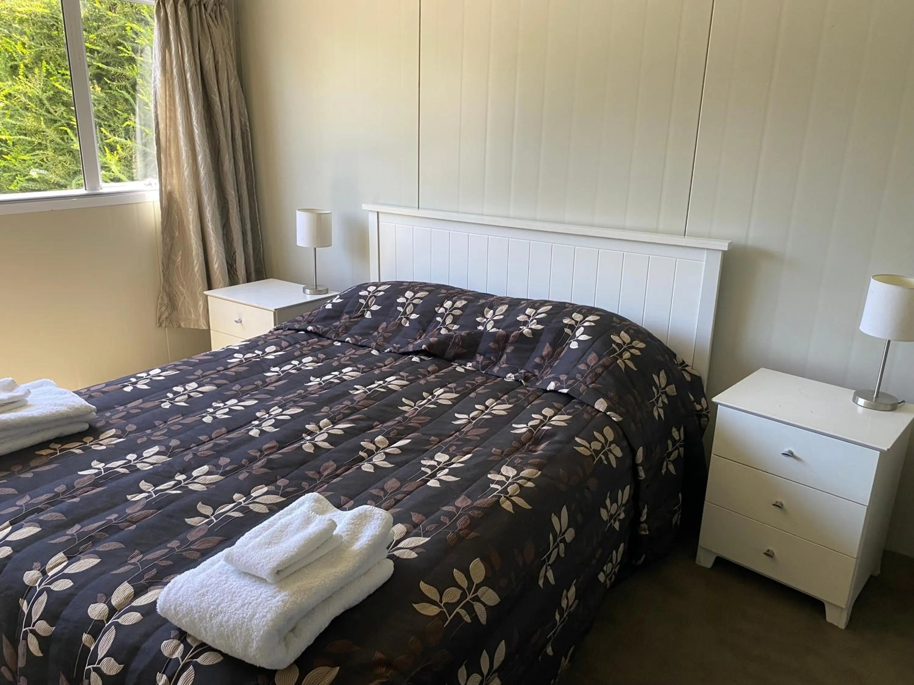 Bed in Rangiora Eco Holiday Park