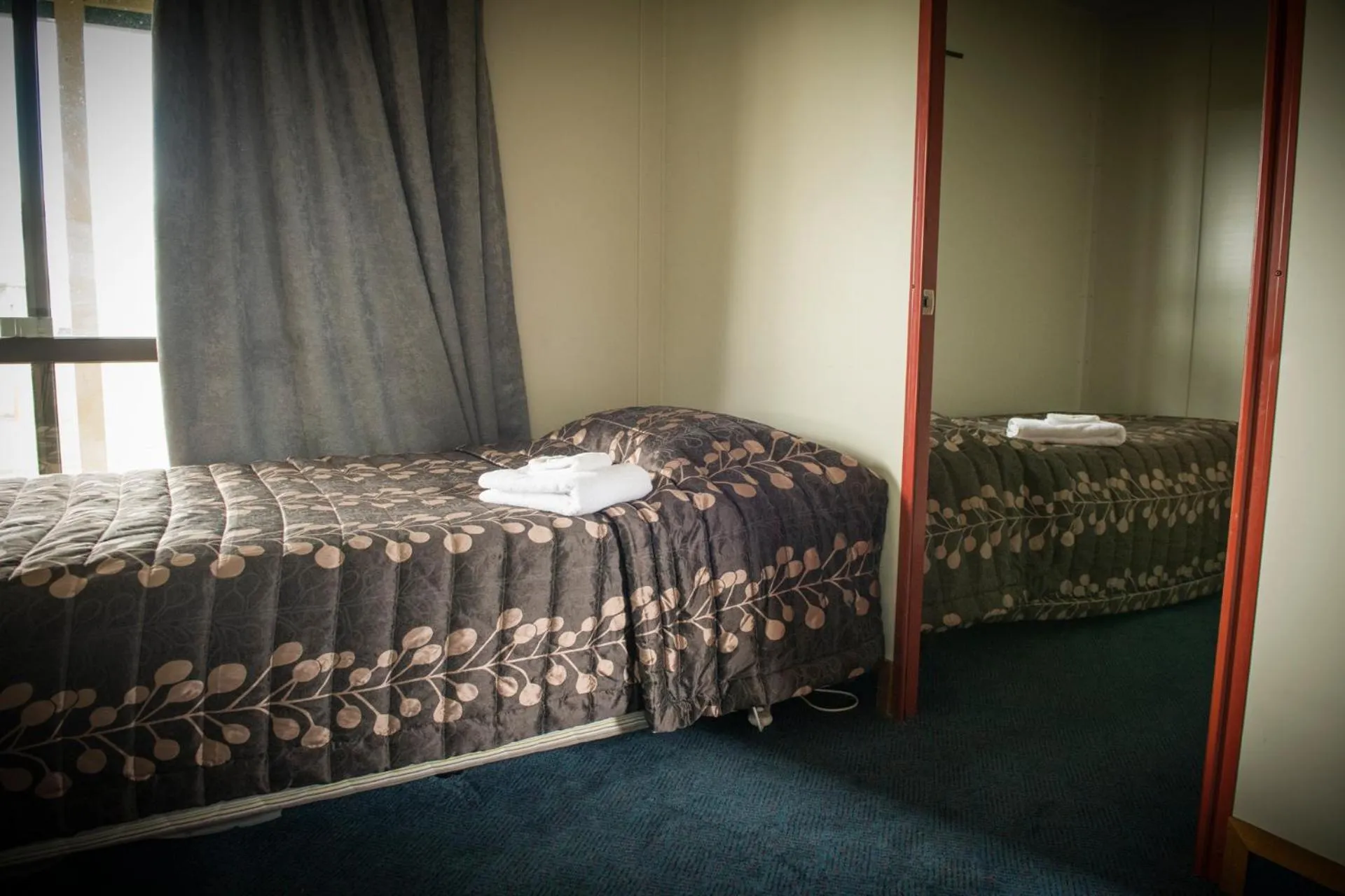 Bed in Rangiora Eco Holiday Park