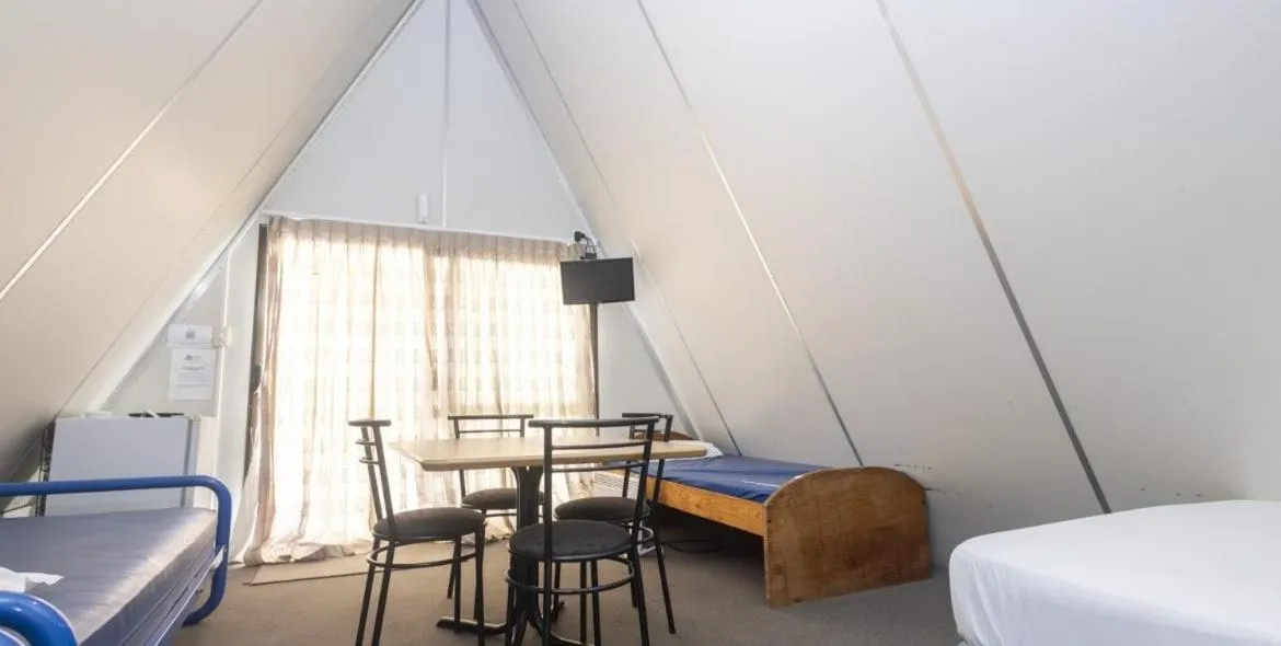 Bed in Rangiora Eco Holiday Park