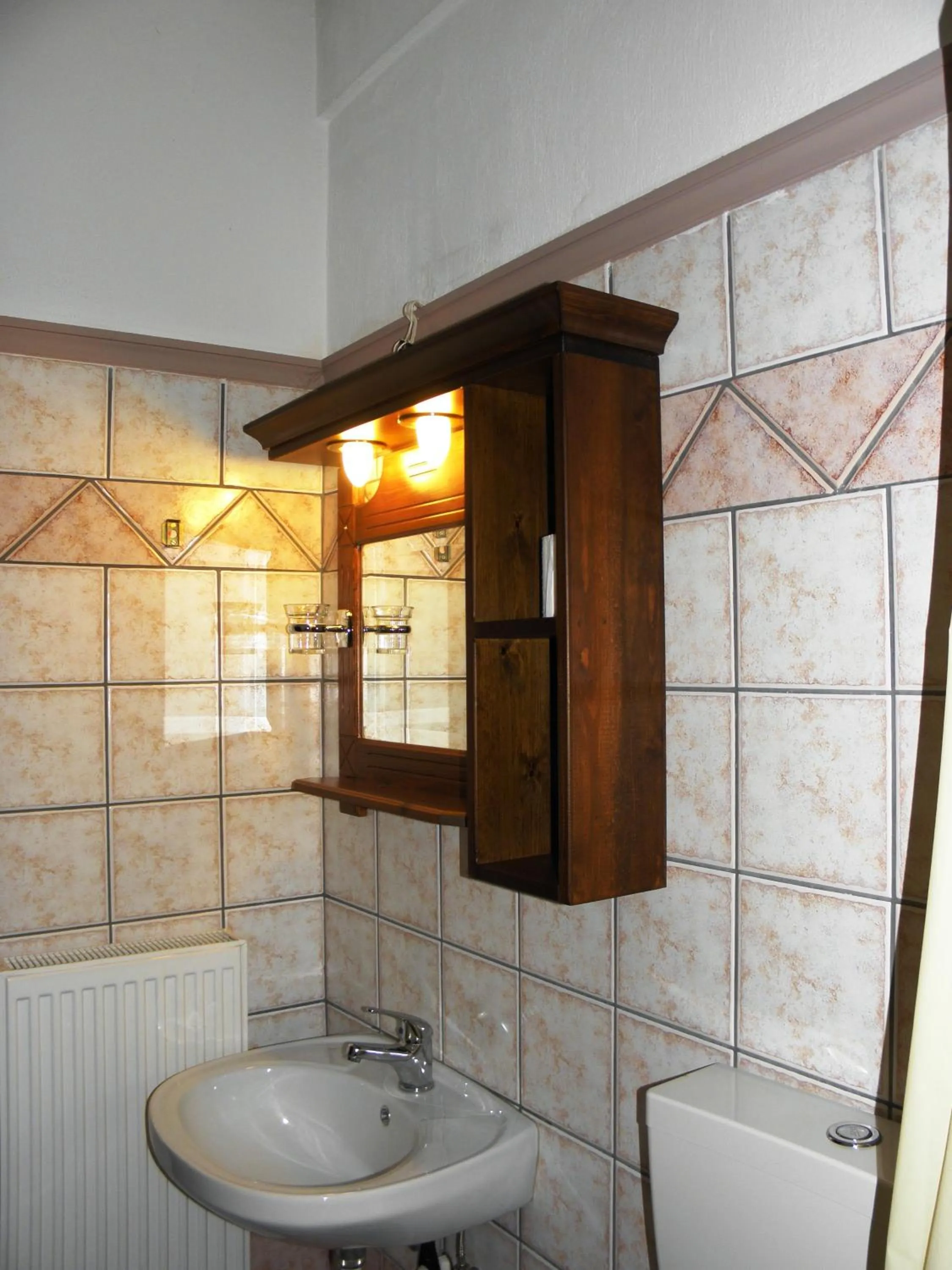 Bathroom in Hotel Mpakou