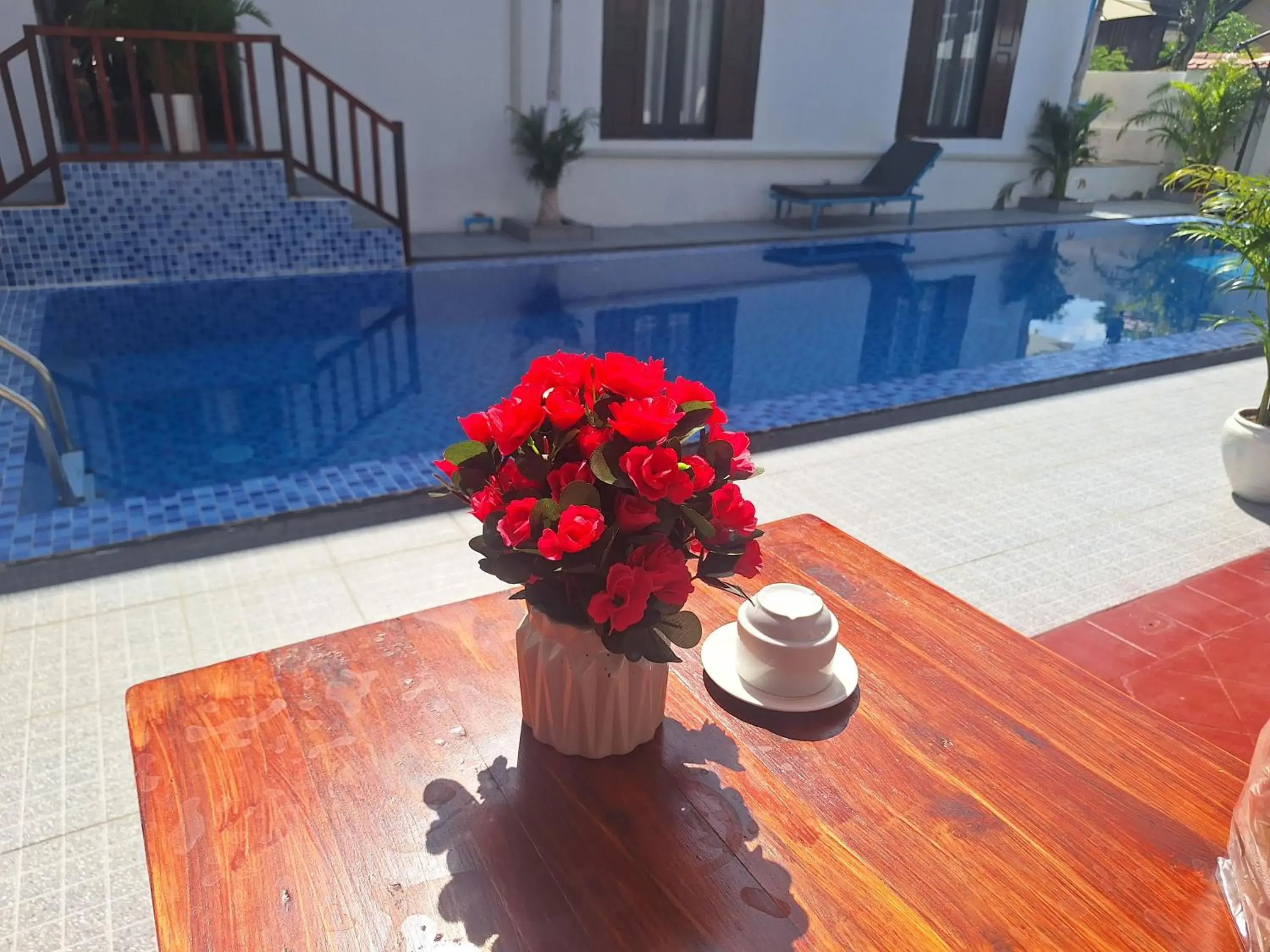 Triple Room with Pool View in Luang Prabang Pavilion Hotel & Travel Triple Room with Pool View in Luang Prabang Pavilion Hotel & Travel