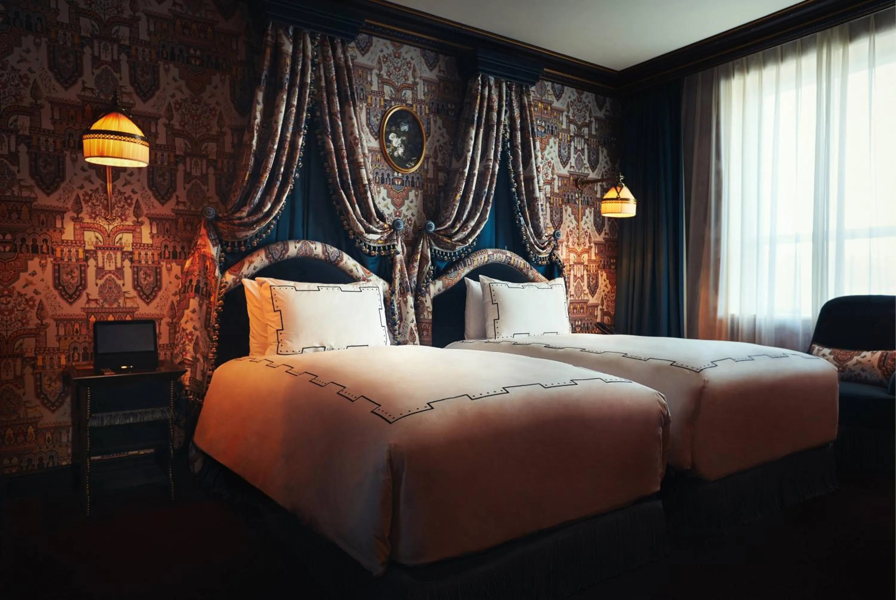 Bed in L'Escape Hotel