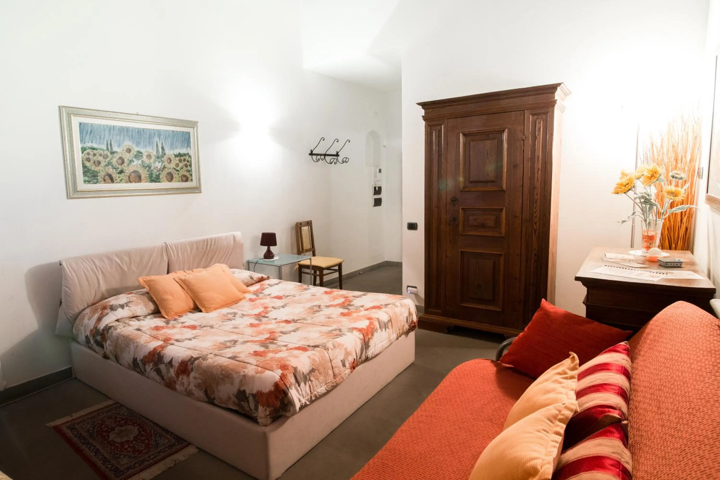 Bed in La Corte Del Re Suite & Rooms Arezzo