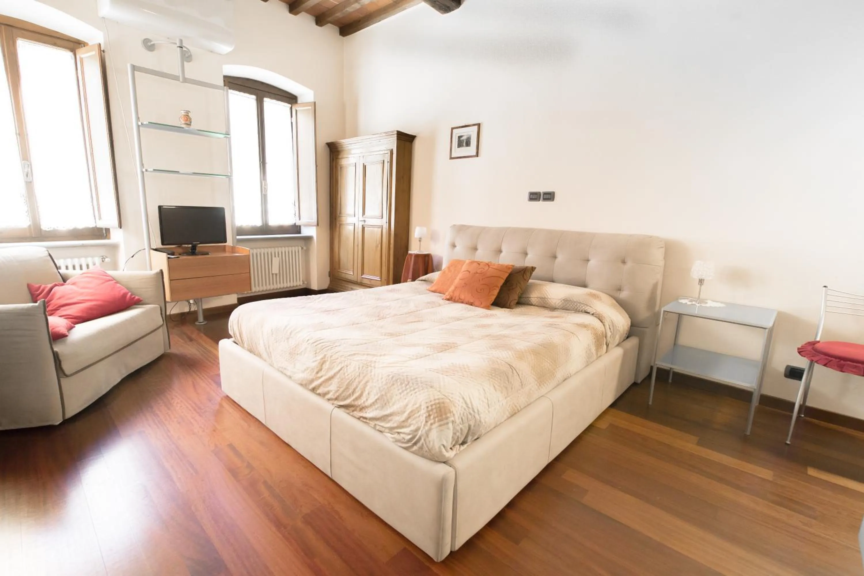 Bed in La Corte Del Re Suite & Rooms Arezzo