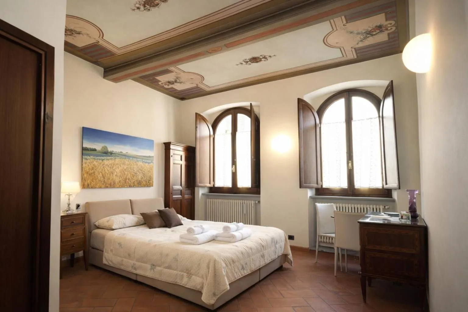 Bed in La Corte Del Re Suite & Rooms Arezzo