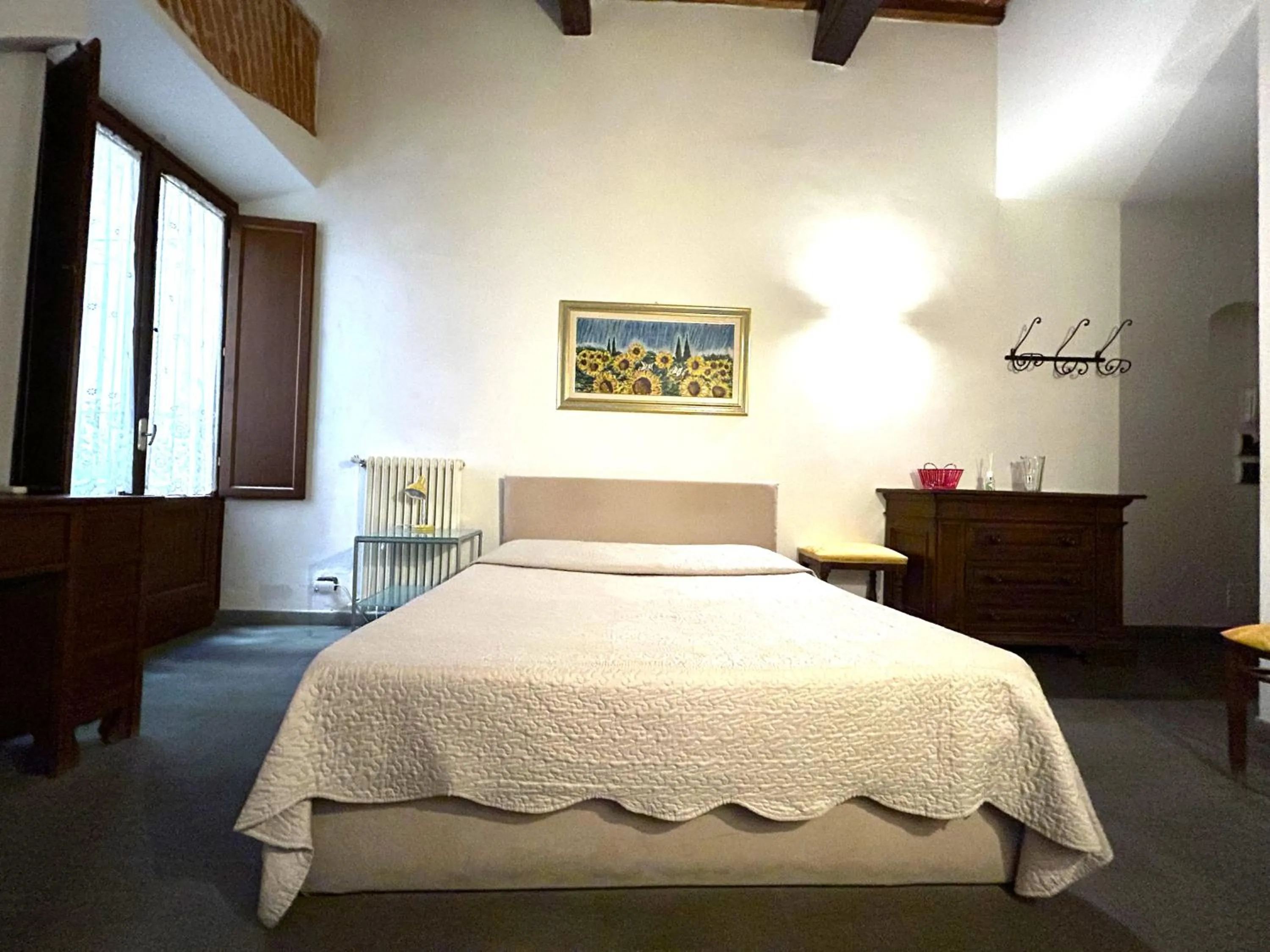 Bed in La Corte Del Re Suite & Rooms Arezzo