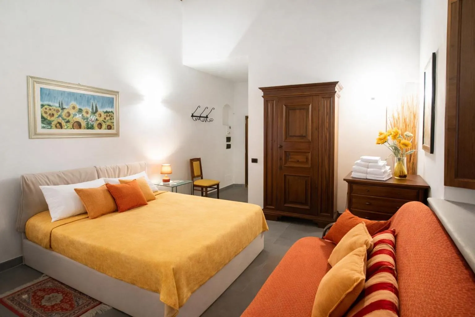 Bed in La Corte Del Re Suite & Rooms Arezzo