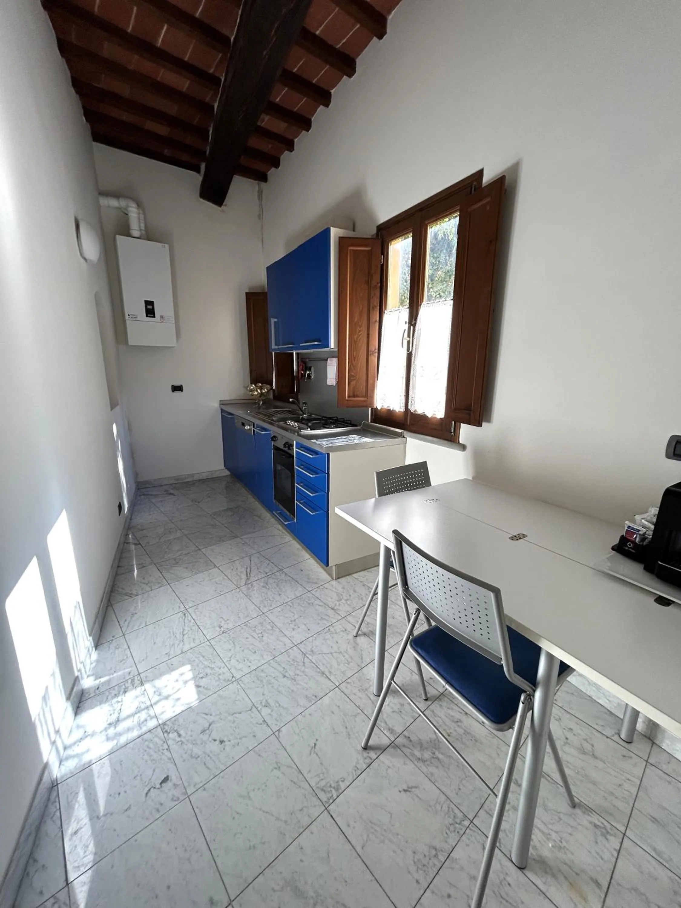 Kitchen or kitchenette in La Corte Del Re Suite & Rooms Arezzo