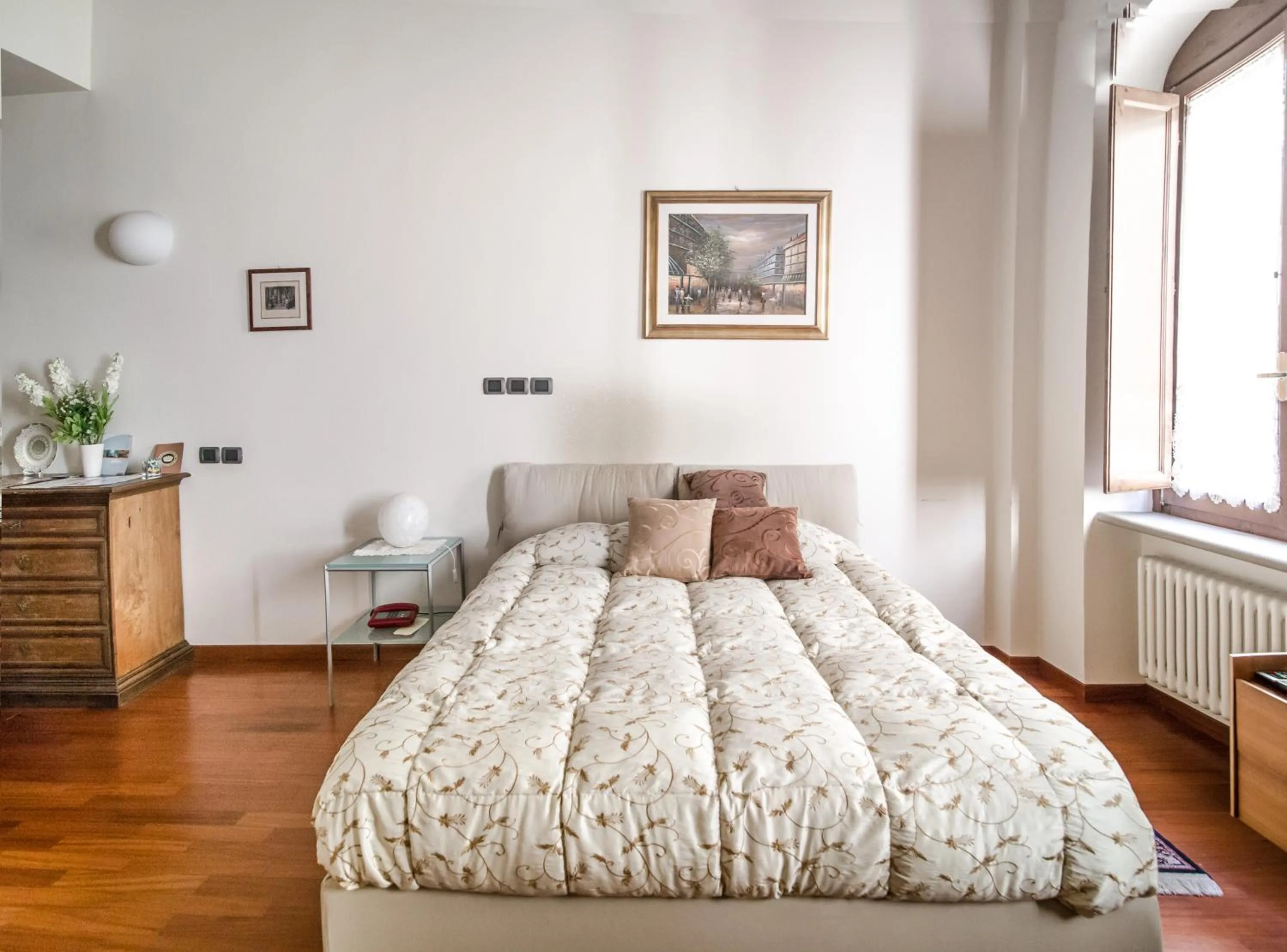 Bed in La Corte Del Re Suite & Rooms Arezzo