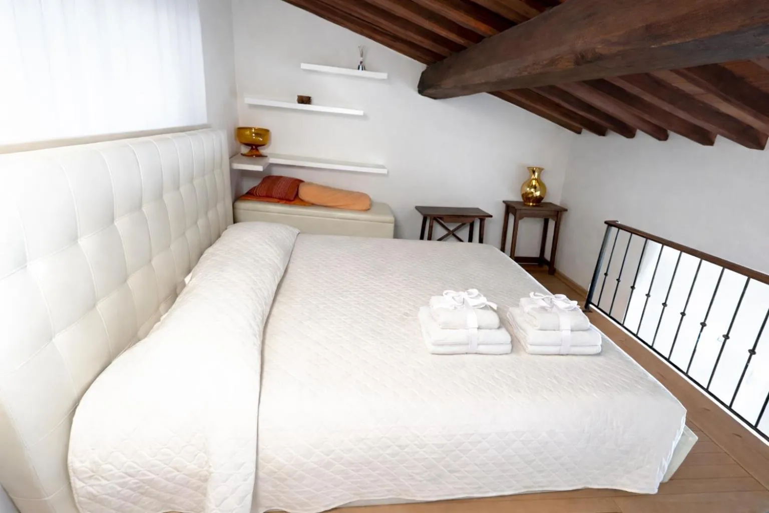 Bed in La Corte Del Re Suite & Rooms Arezzo