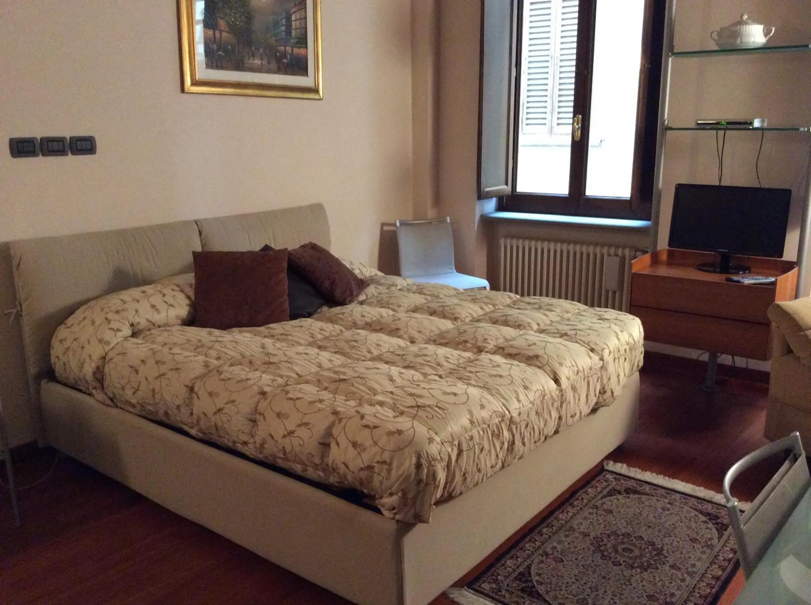 Bed in La Corte Del Re Suite & Rooms Arezzo