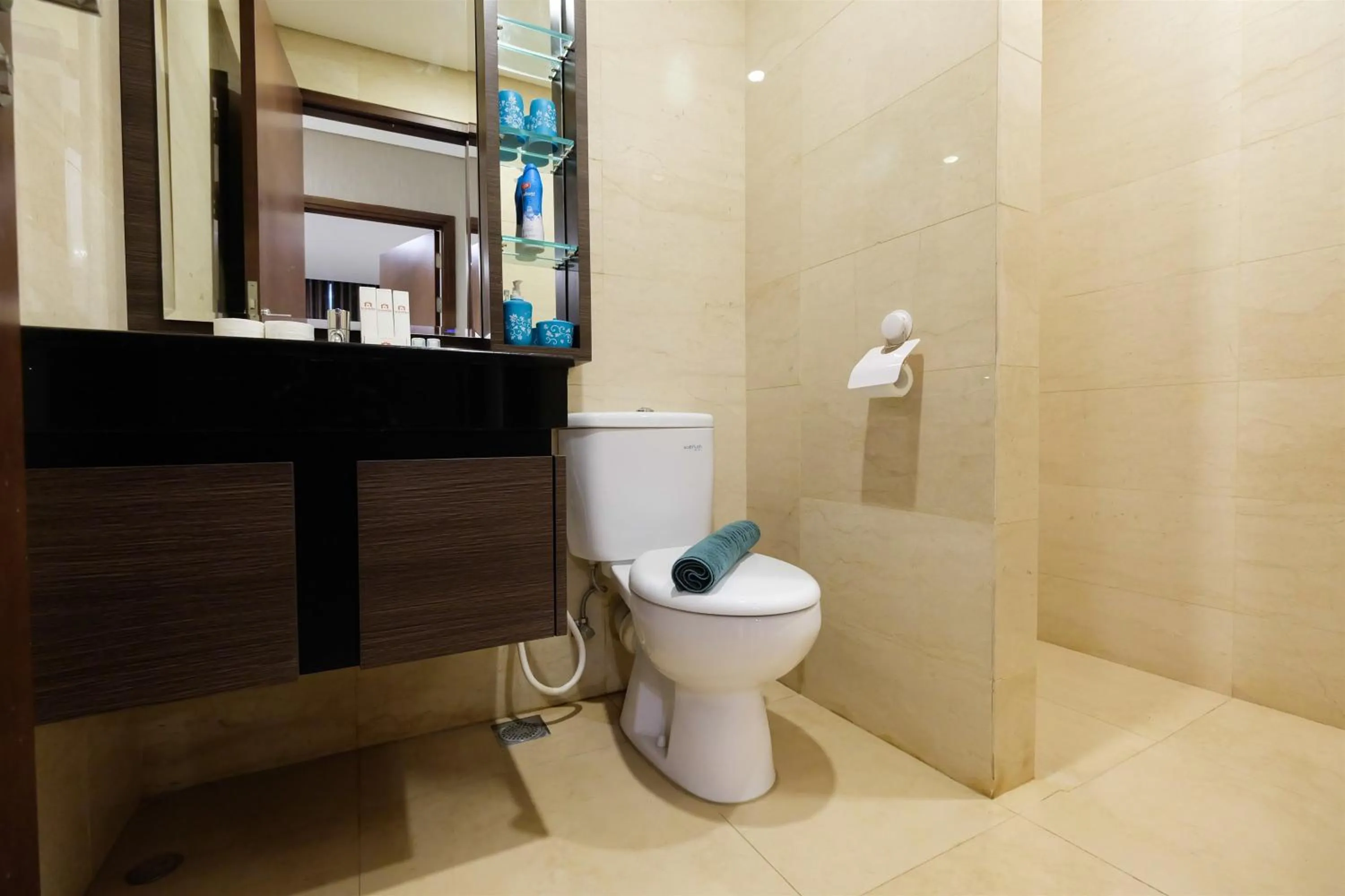 Bathroom in Modern Elegant Design 2BR L'Avenue Apartment By Travelio