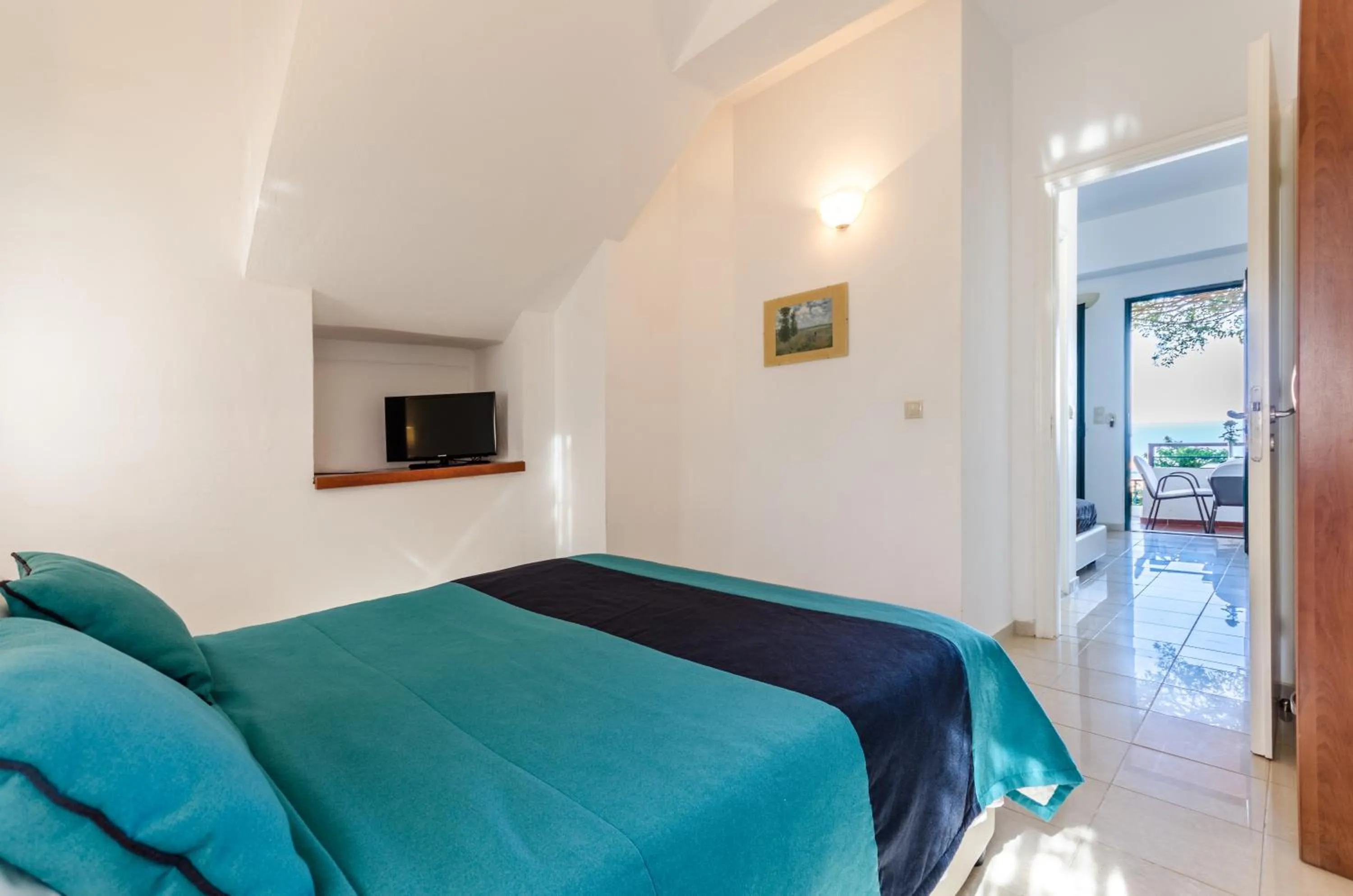 Bed in Pela Mare Hotel