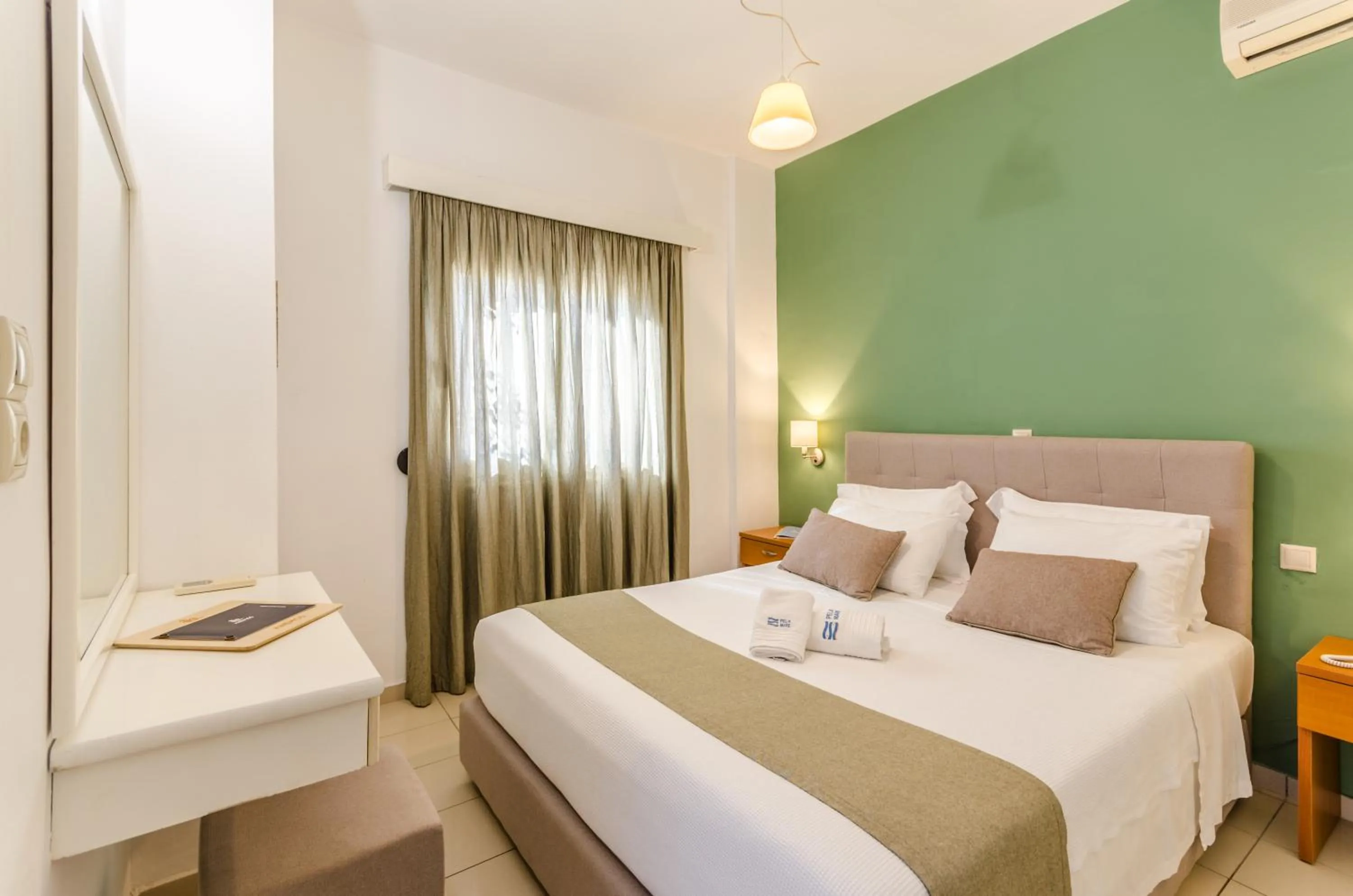 Bed in Pela Mare Hotel