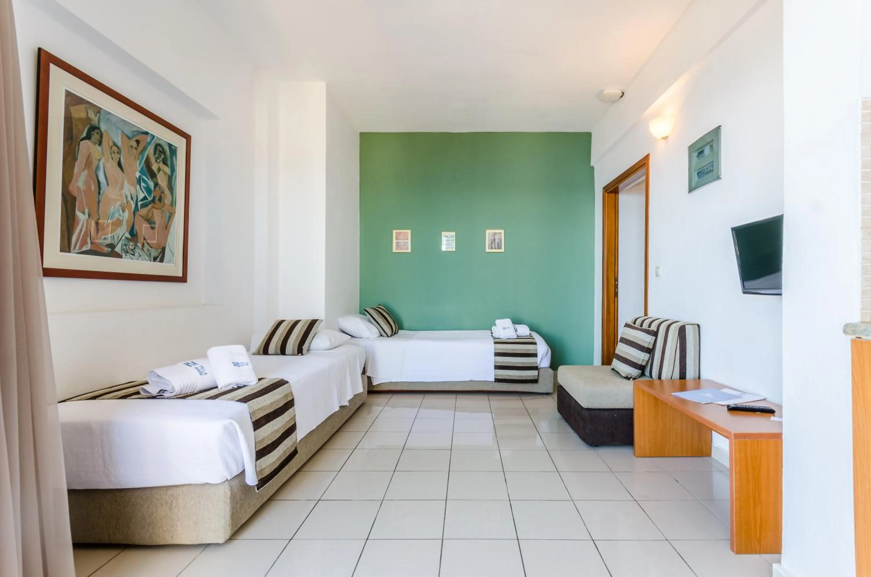 Bed in Pela Mare Hotel