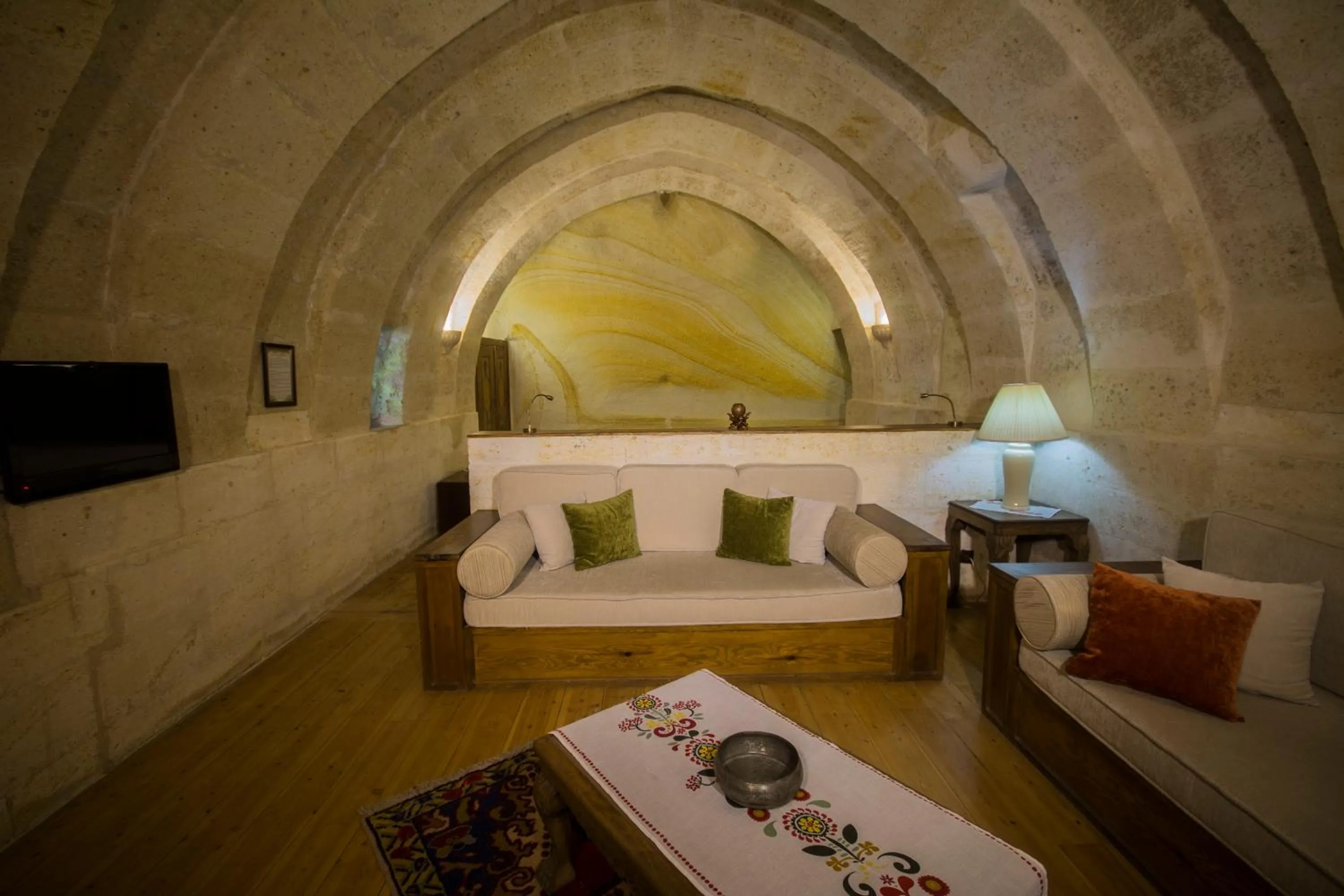 Seating area, Bed in Fresco Cave Suites Cappadocia