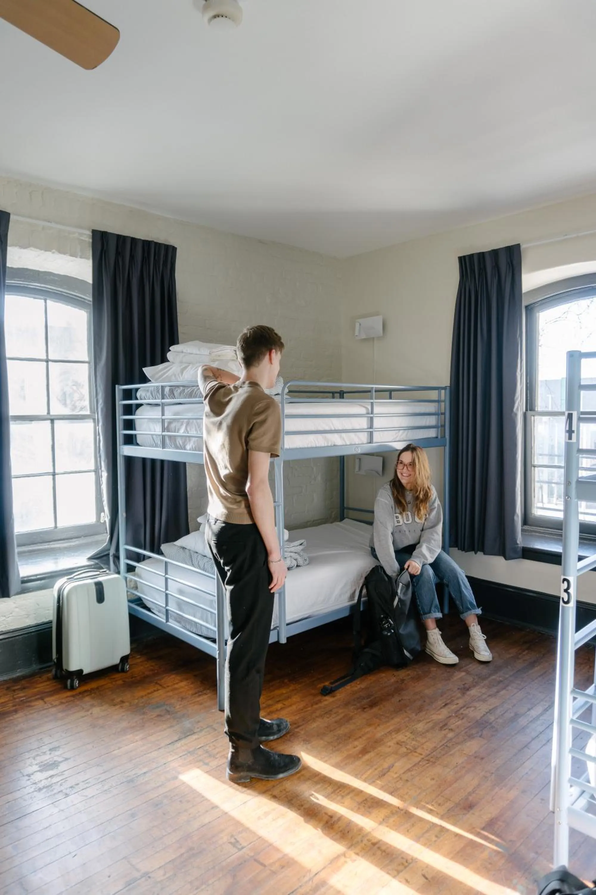 group of guests, Bed in Saintlo Ottawa Jail Hostel