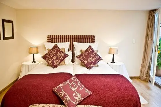 Bed in Villa Moringa Guesthouse