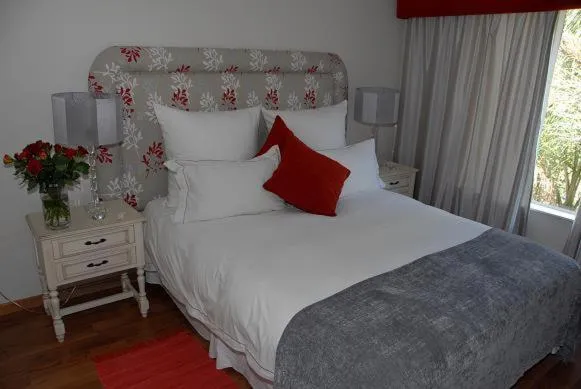 Bed in Villa Moringa Guesthouse