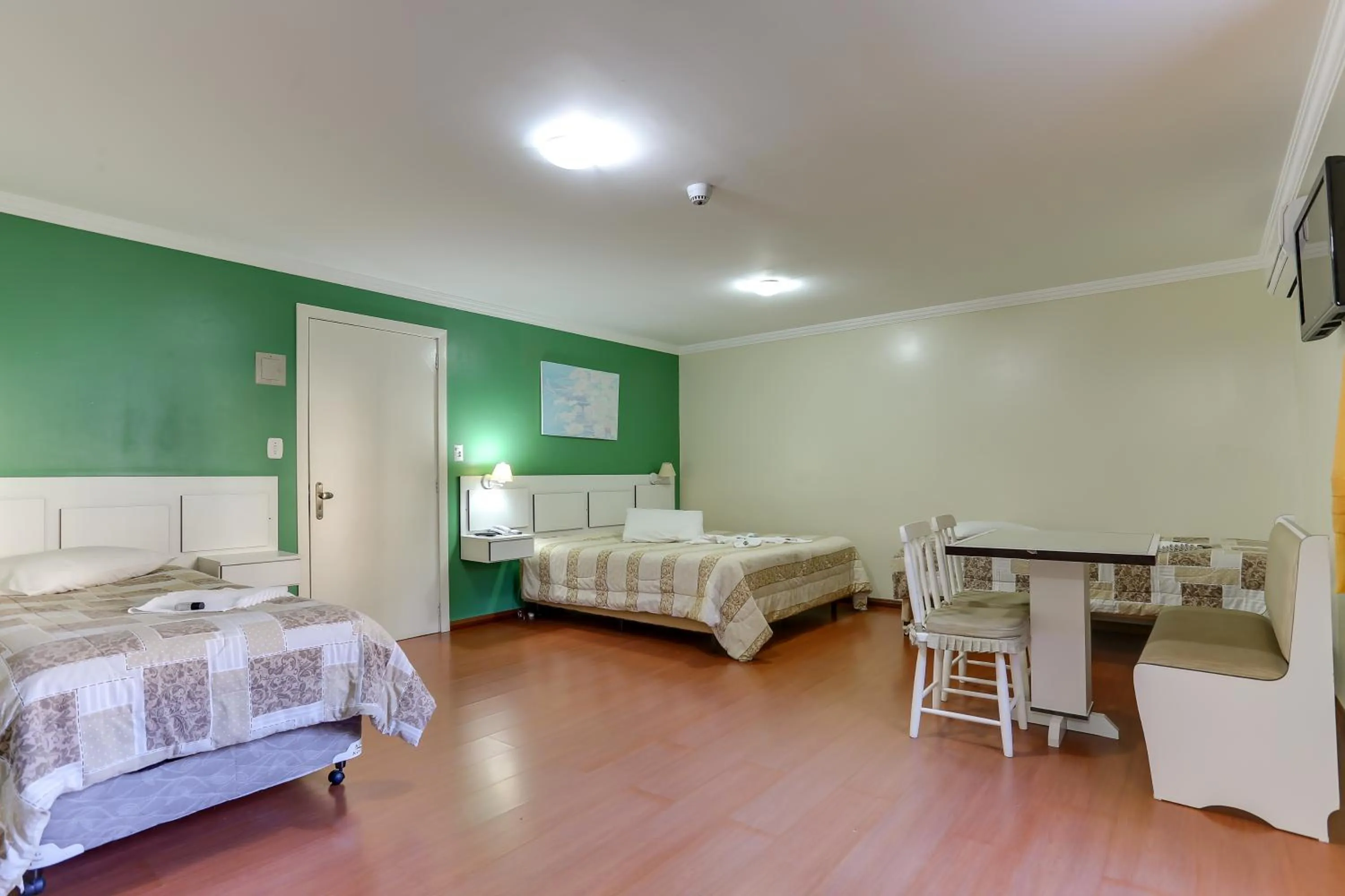 Dining area, Bed in Zermatt Hotel