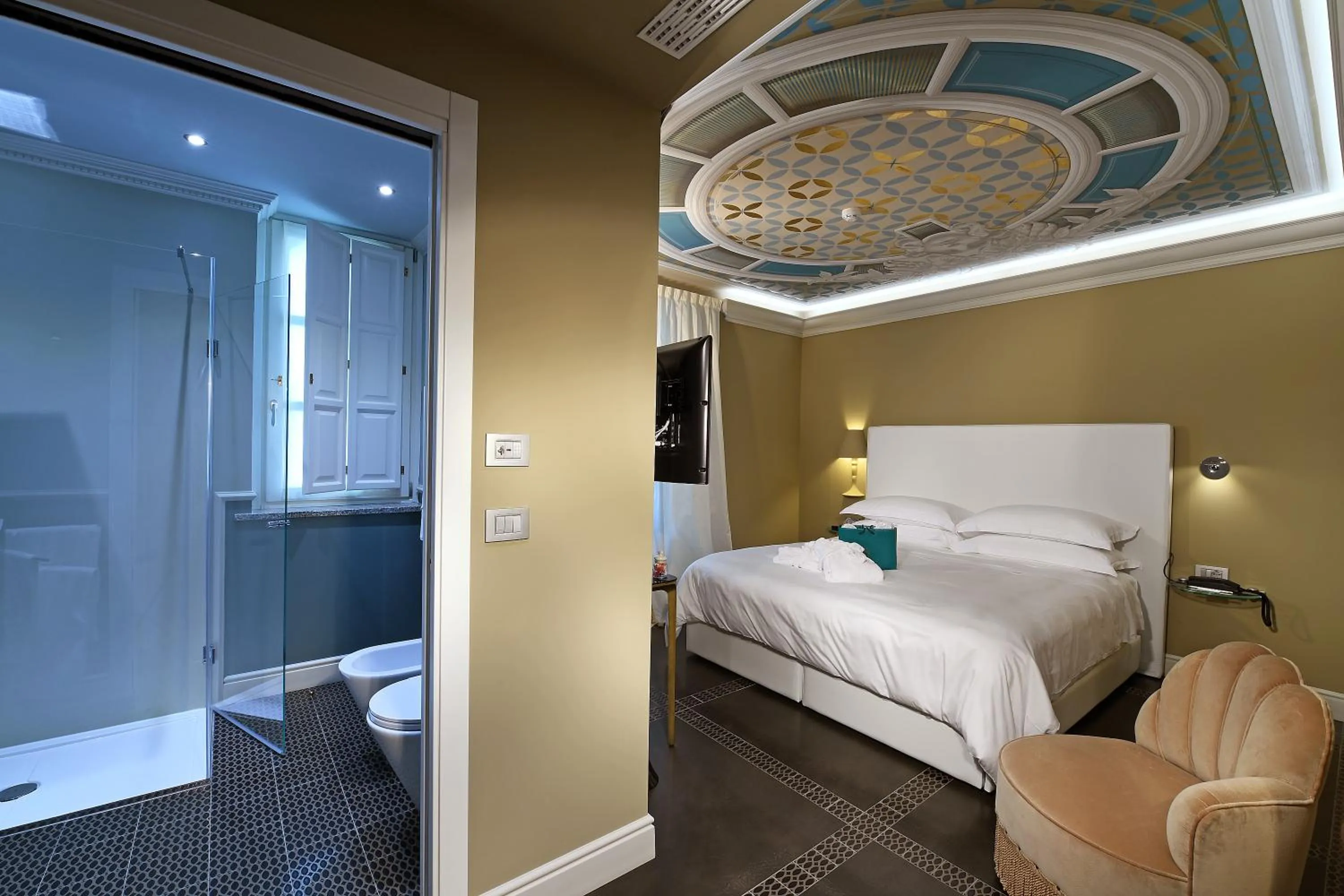 Bed in La Ribezza Boutique Hotel