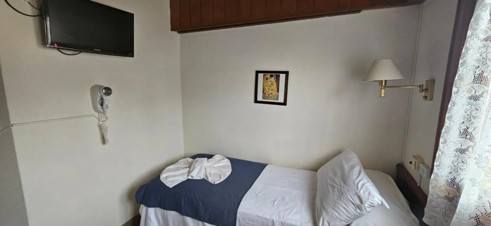 Bed in Hotel Riviera
