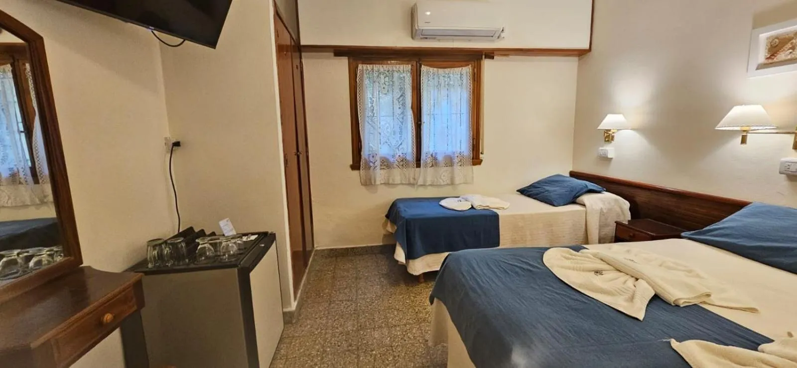 Bed in Hotel Riviera