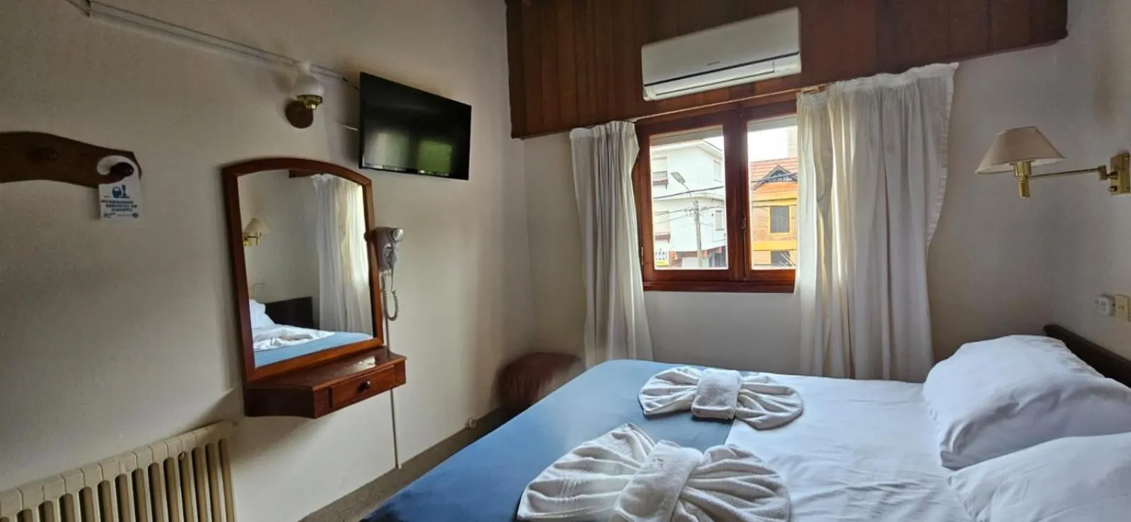 Bed in Hotel Riviera