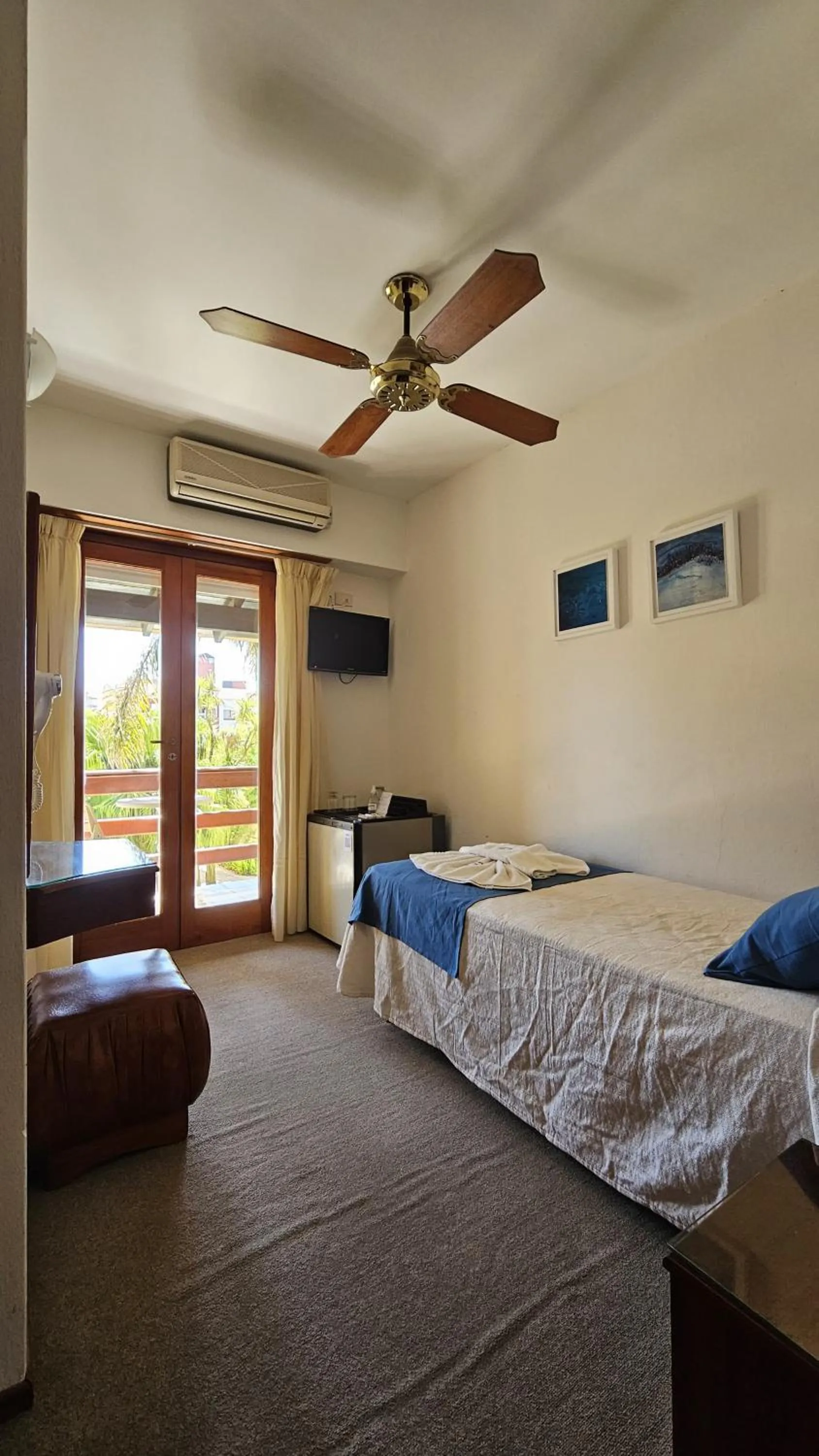 hair dryier, Bed in Hotel Riviera