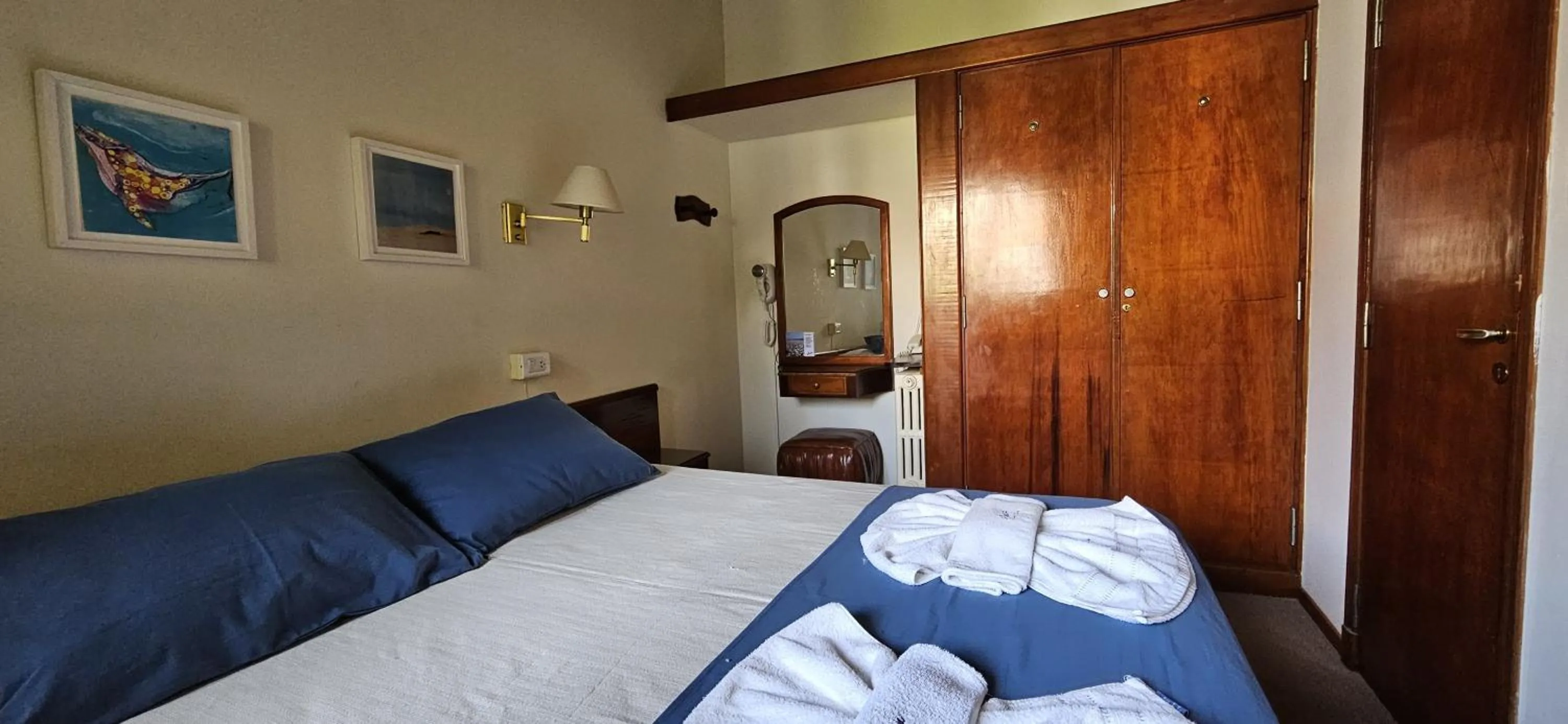 Bed in Hotel Riviera
