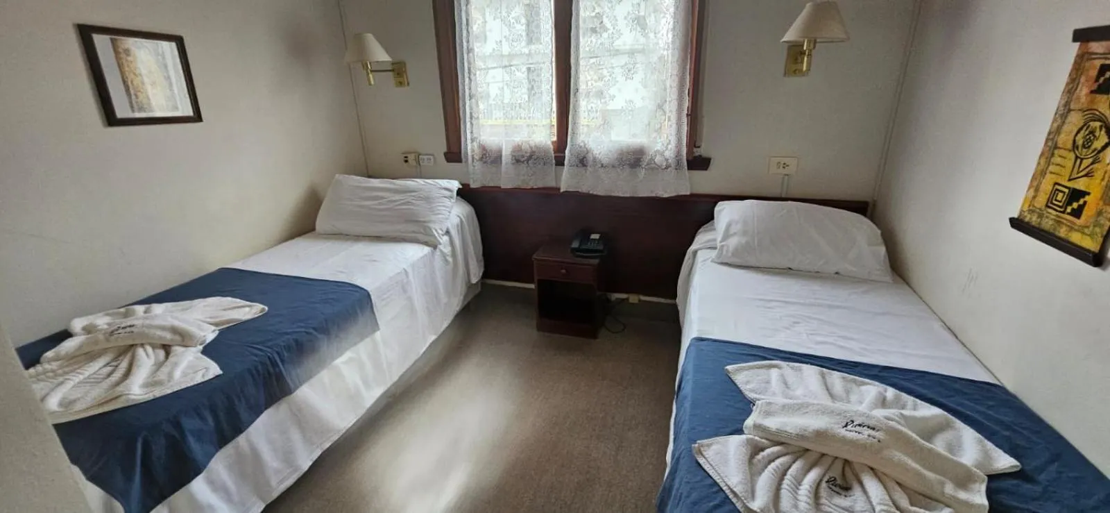 Bed in Hotel Riviera