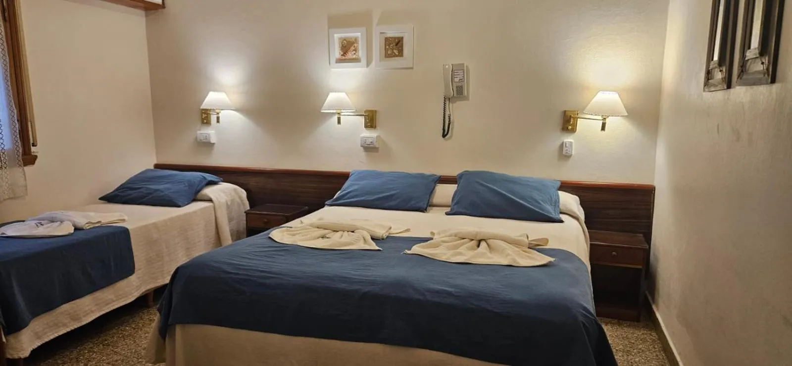 Bed in Hotel Riviera
