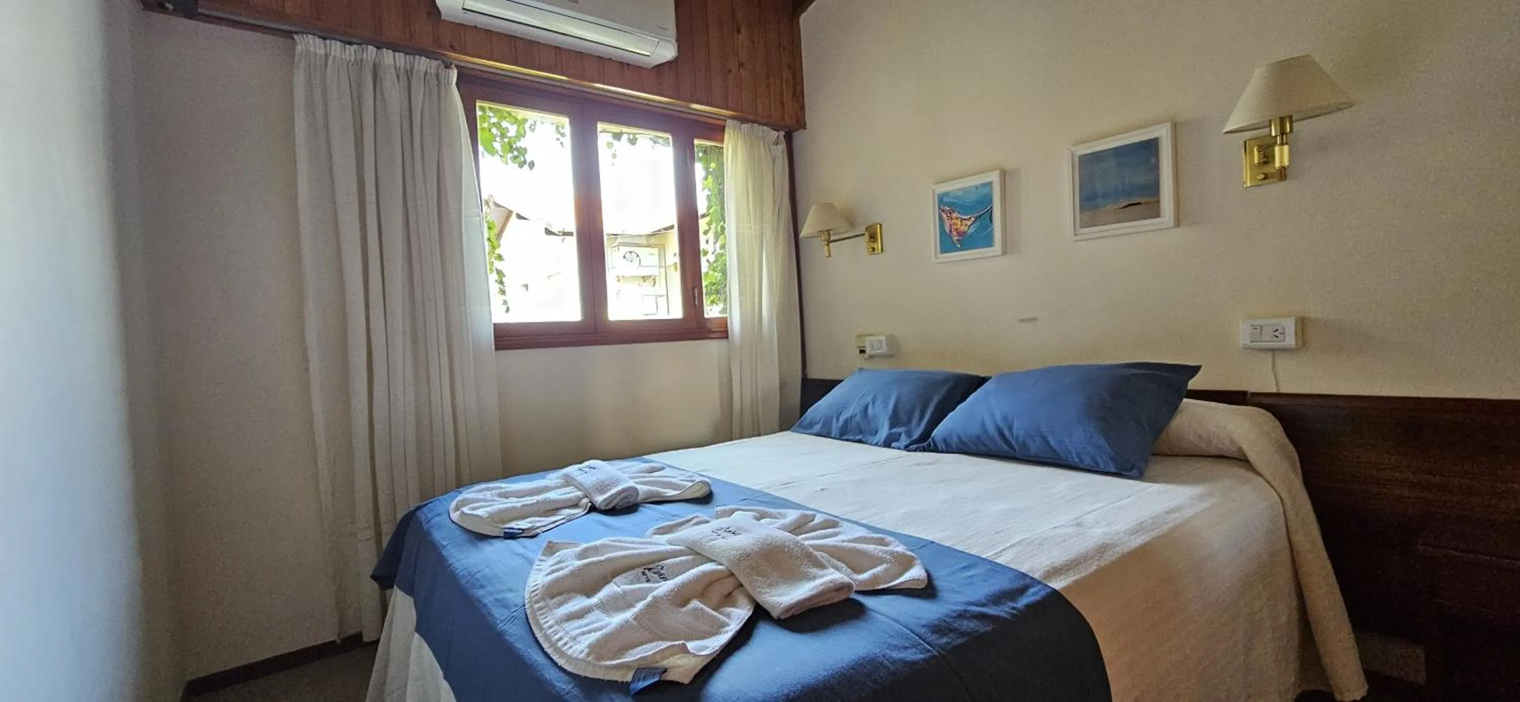 Bed in Hotel Riviera