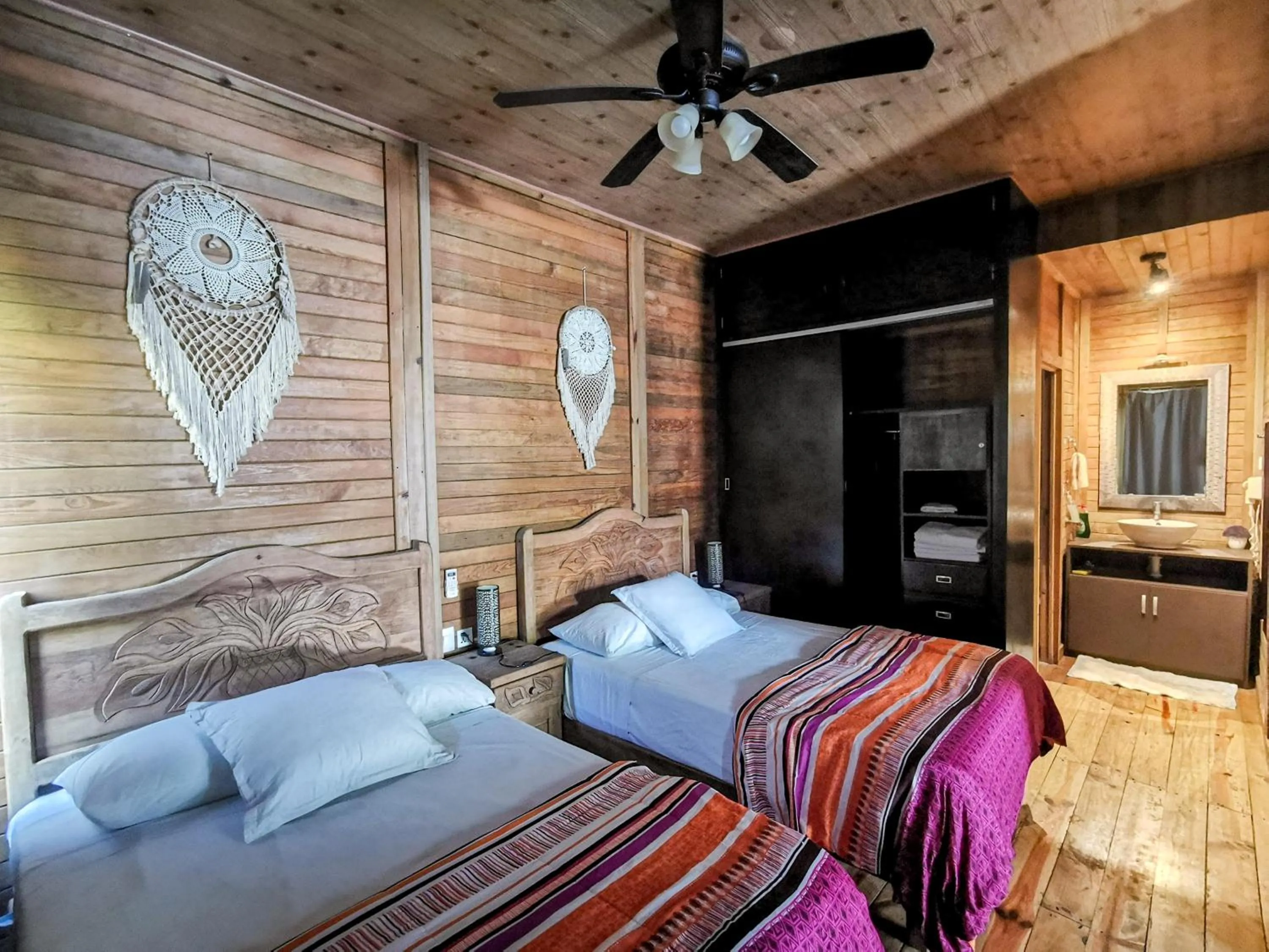 Photo of the whole room, Bed in Alicat Villas