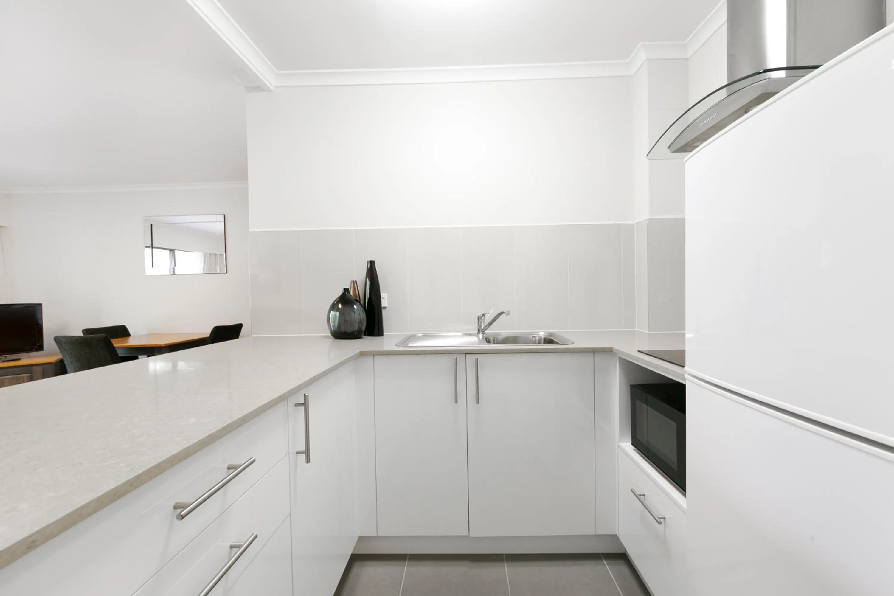 Kitchen or kitchenette in Mt Ommaney Hotel Apartments